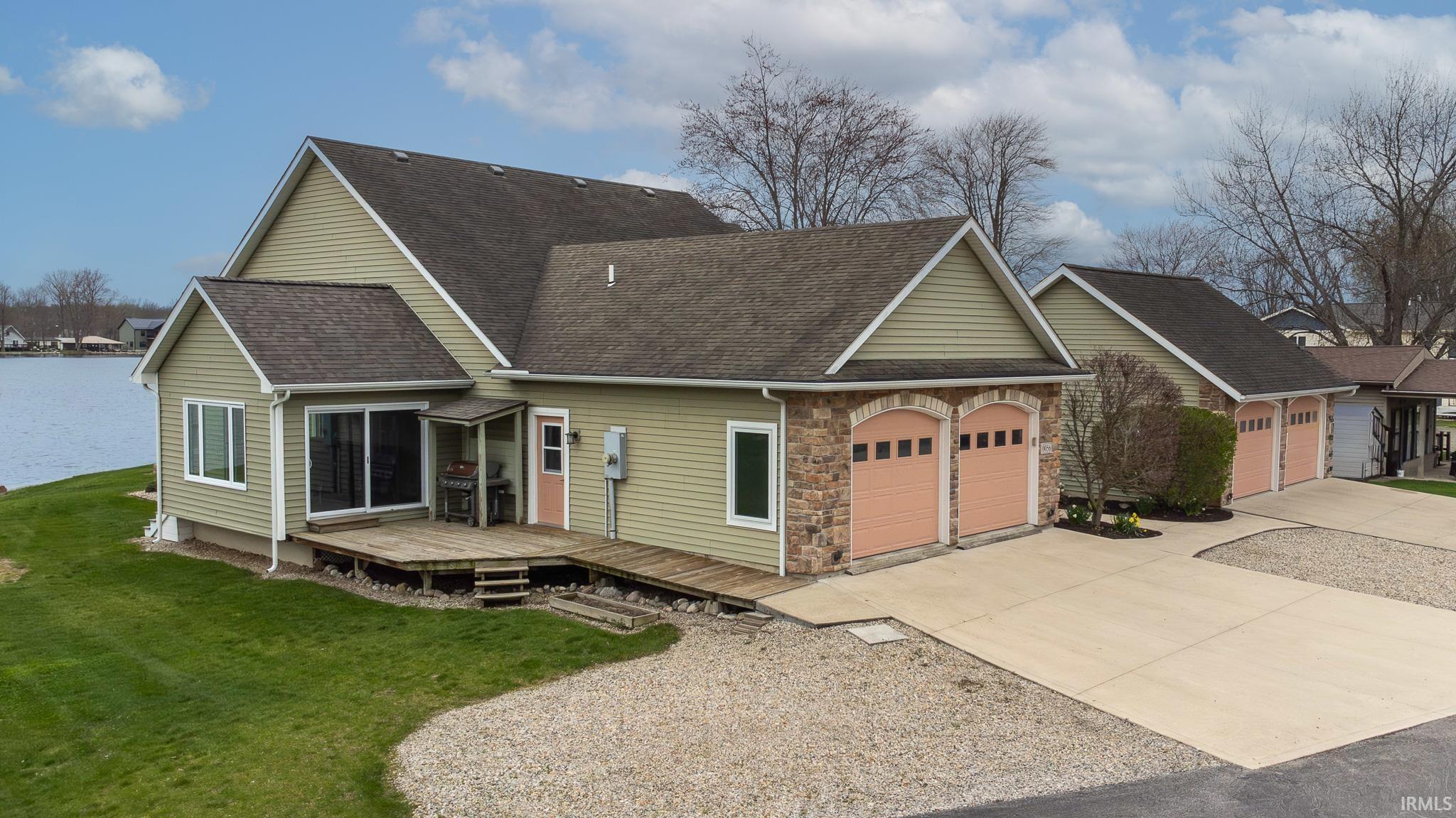 Eastern side of home w/2nd deck area w/grilling area, & also where generator link prep area is.