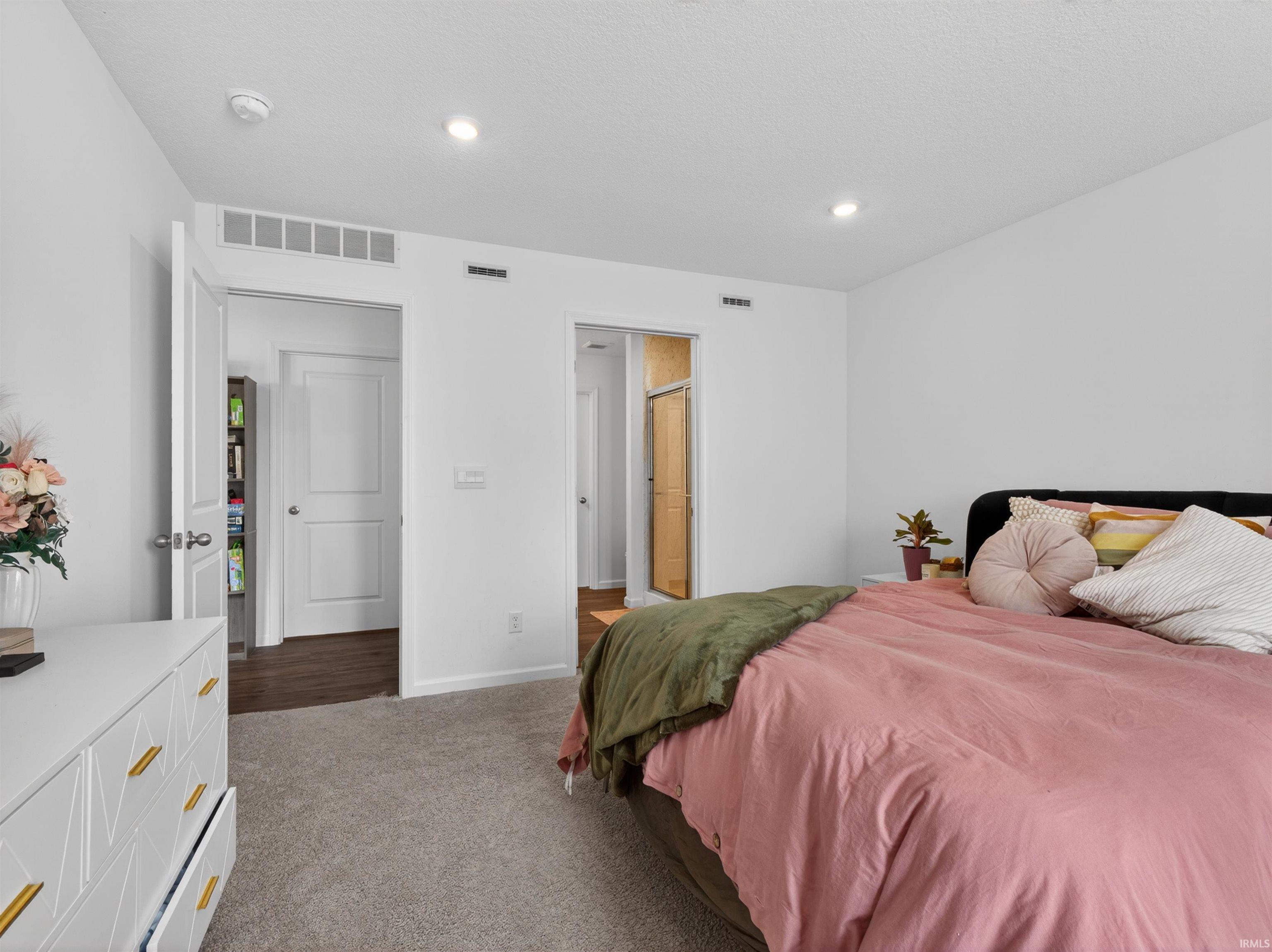 Bedroom featuring carpet flooring and recessed lighting