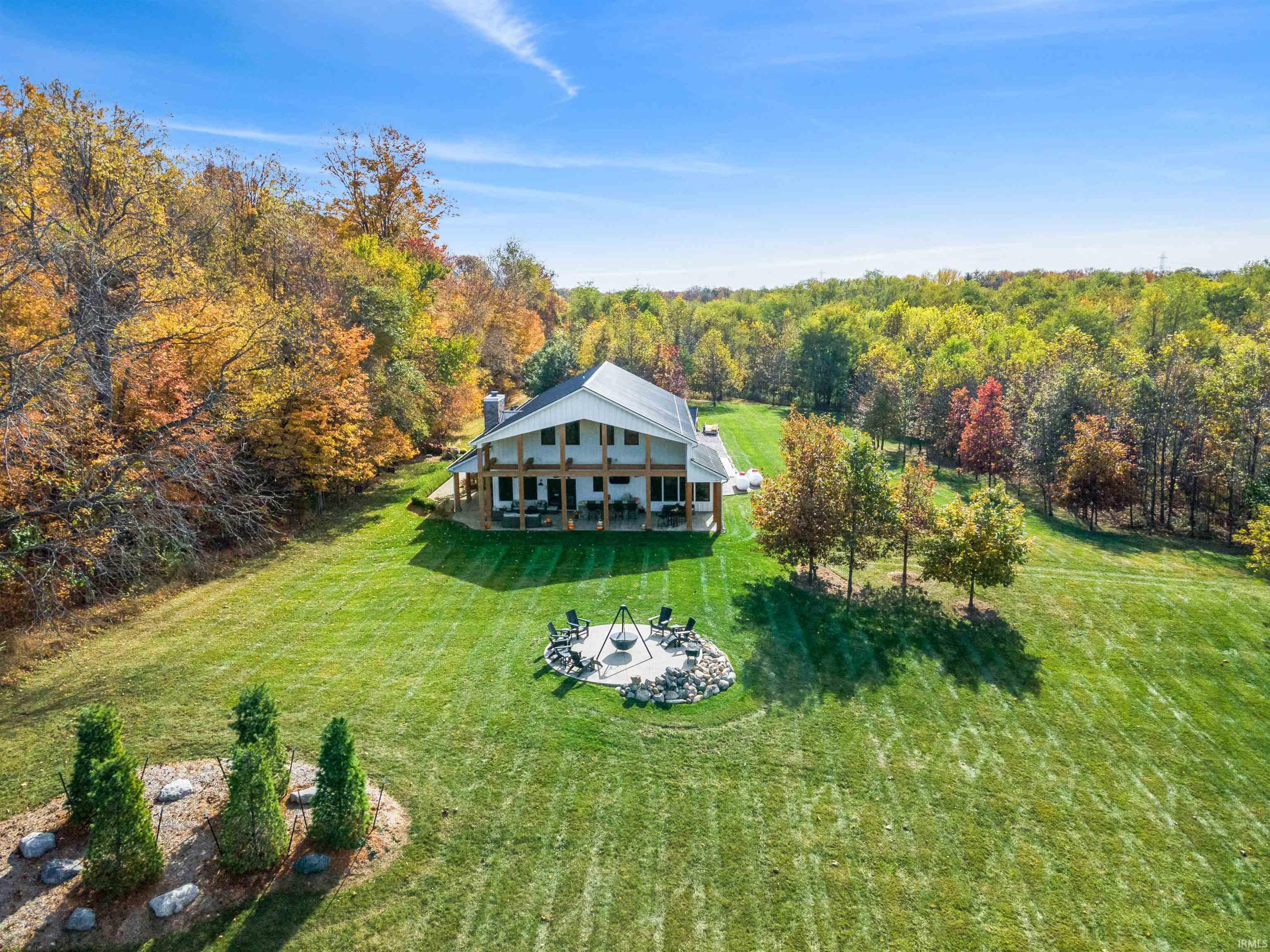 View from above of property featuring a forest