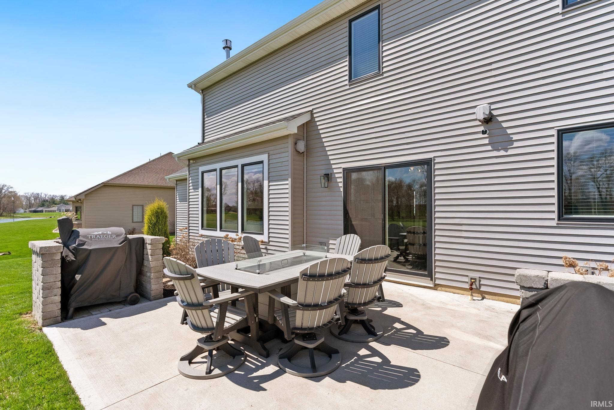 View of patio with outdoor dining area
