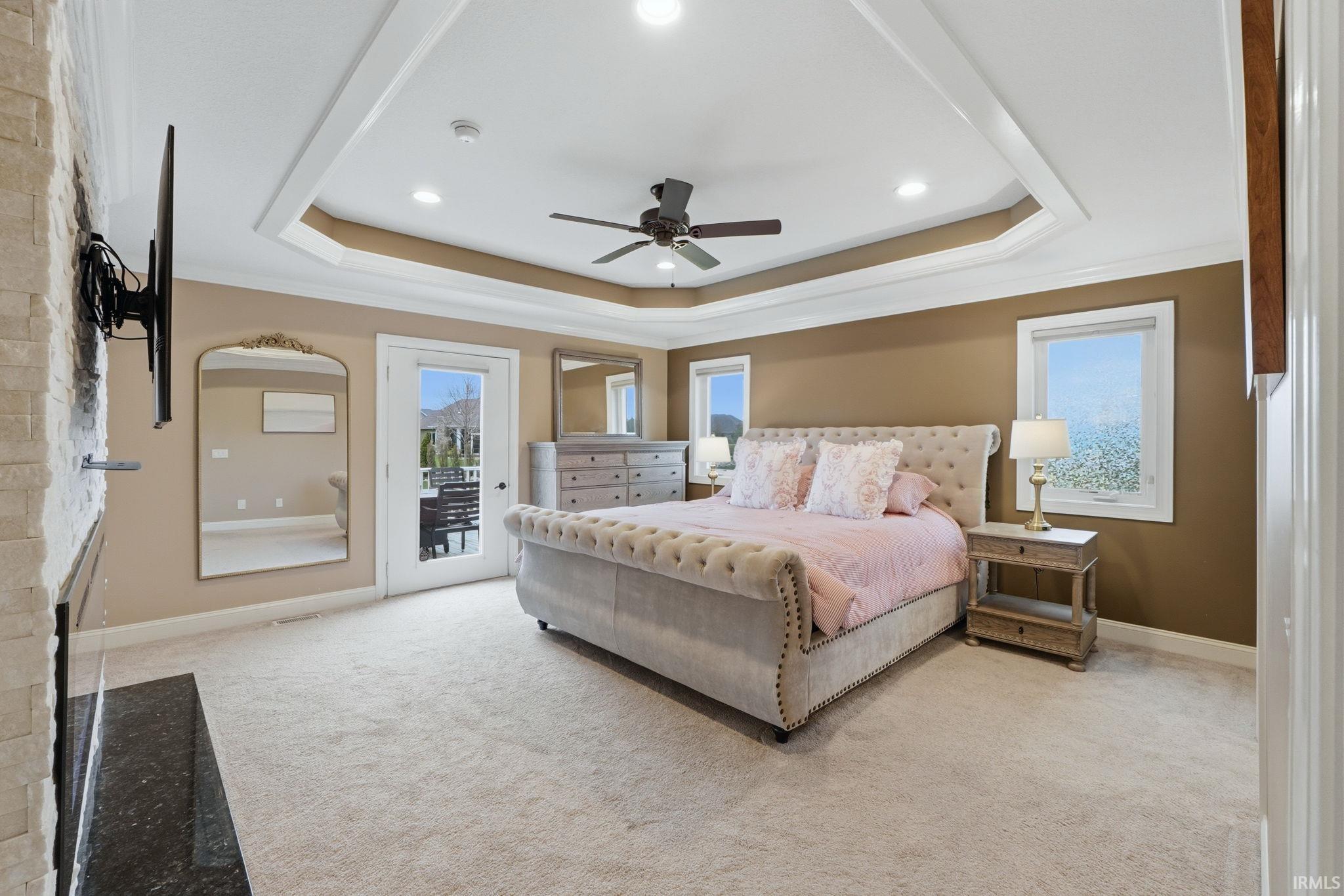 Bedroom featuring ornamental molding, light carpet, access to outside, ceiling fan, and recessed lighting