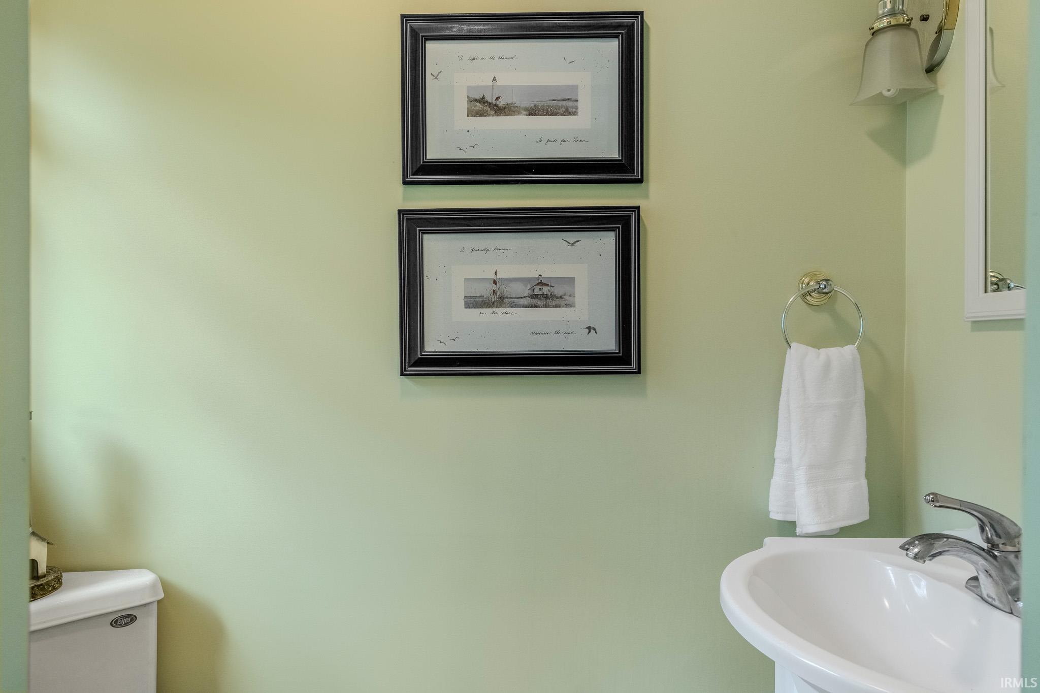 Bathroom featuring toilet and a sink