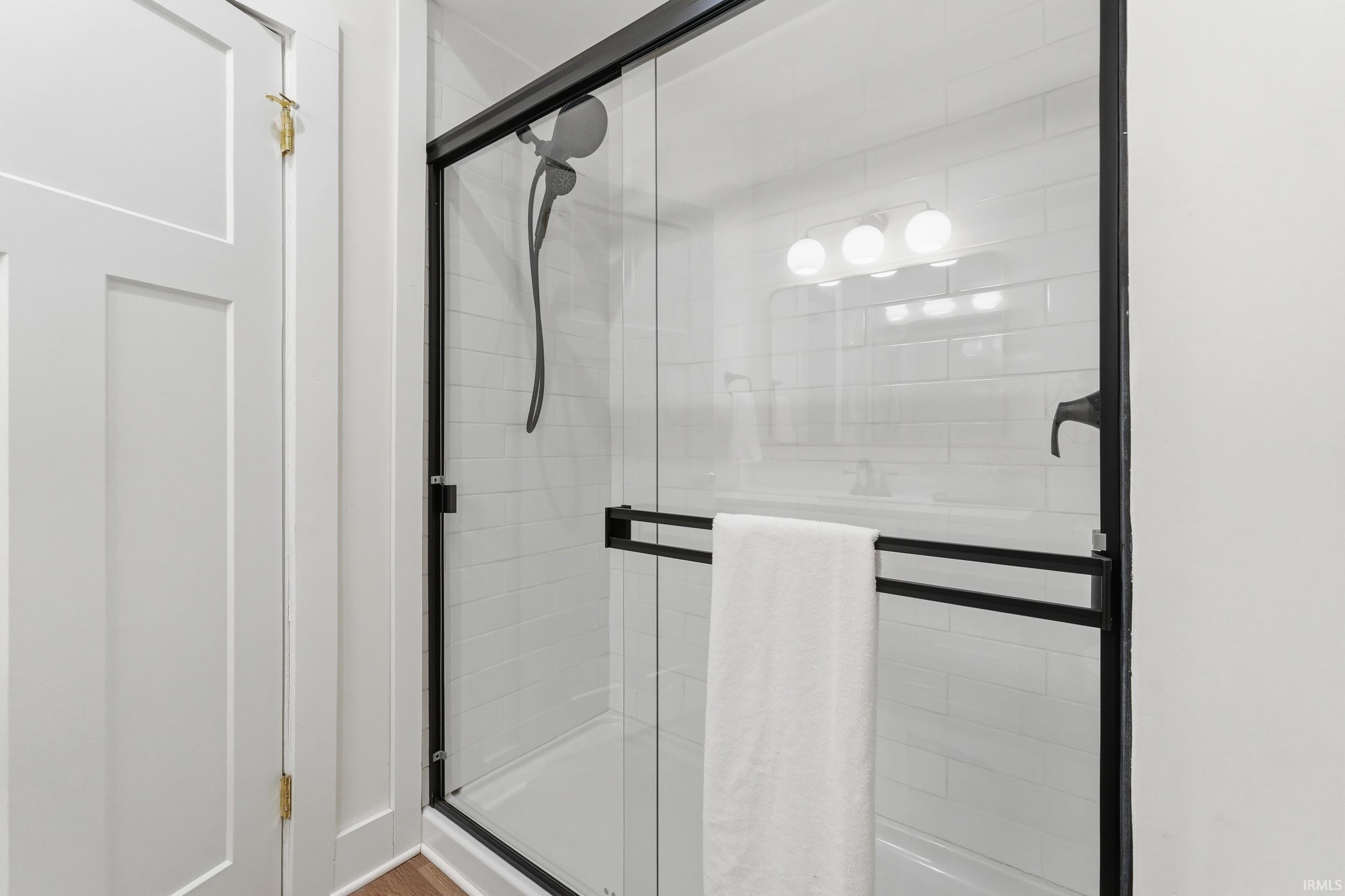 Bathroom featuring a shower stall