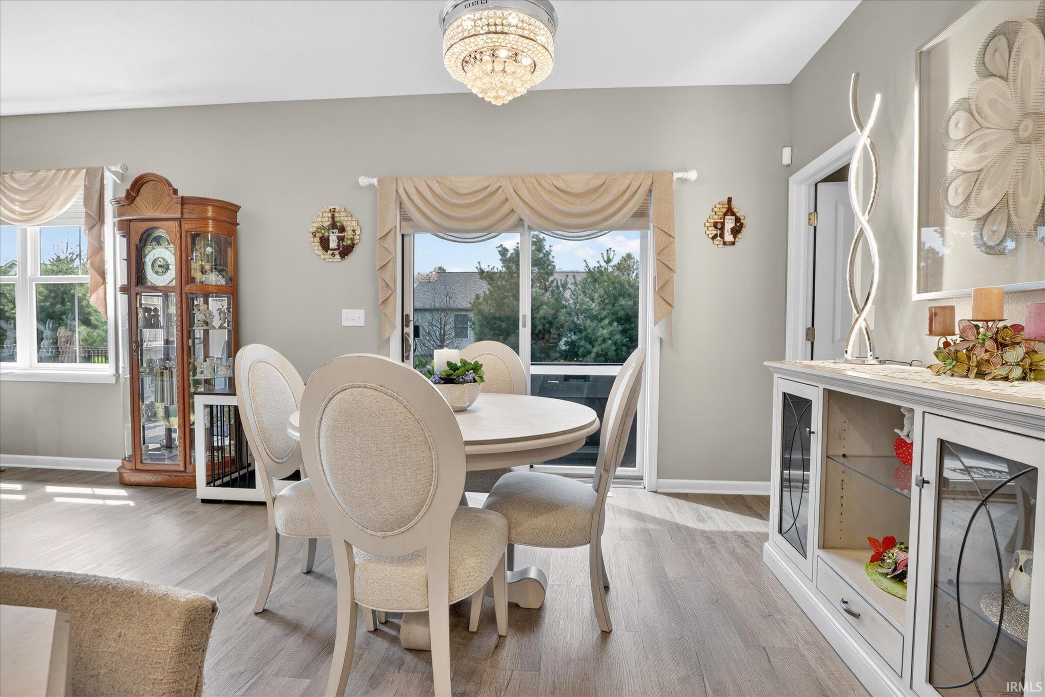 Dining space featuring a chandelier and light wood-style floors