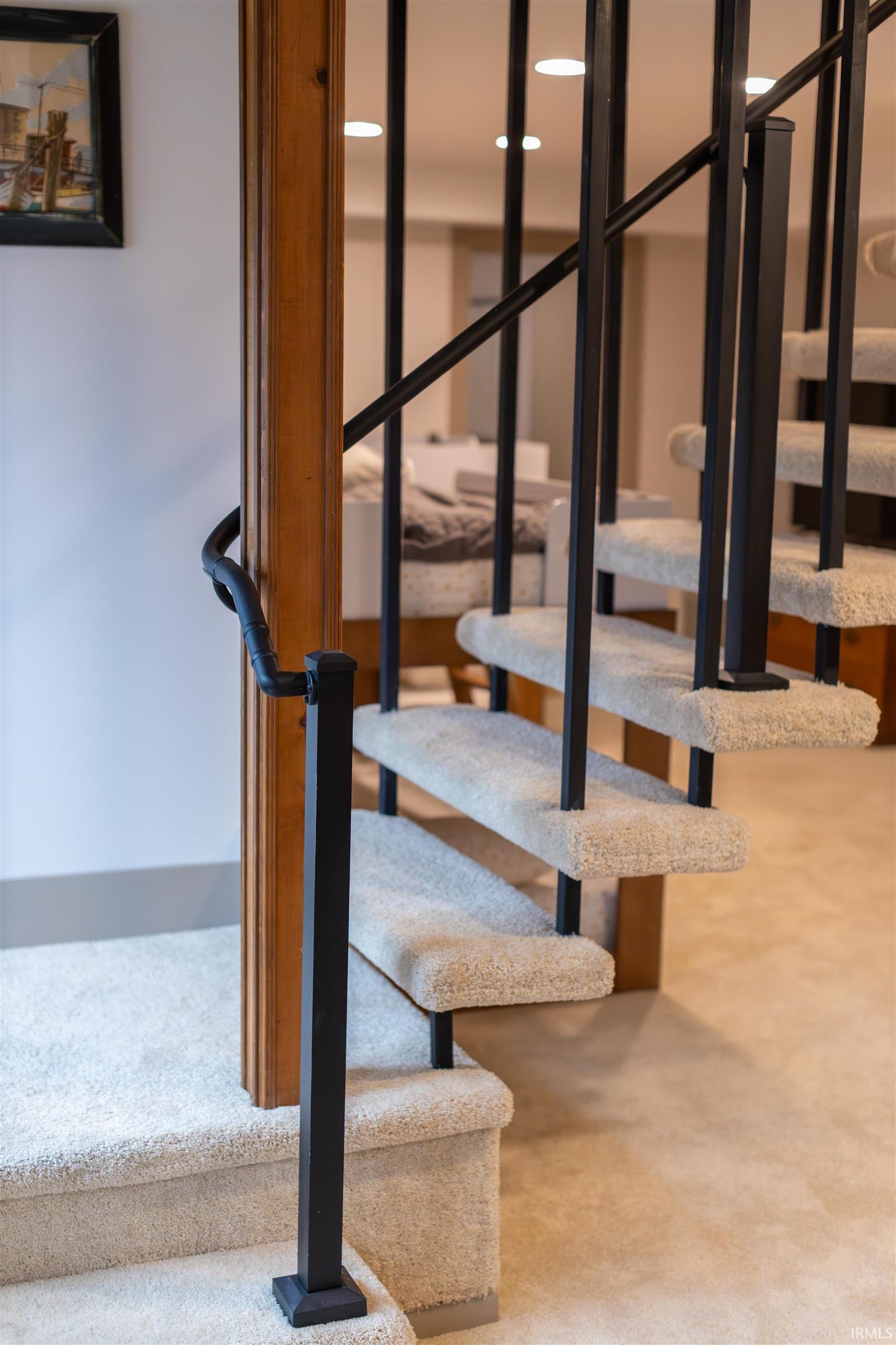 Staircase with carpet flooring