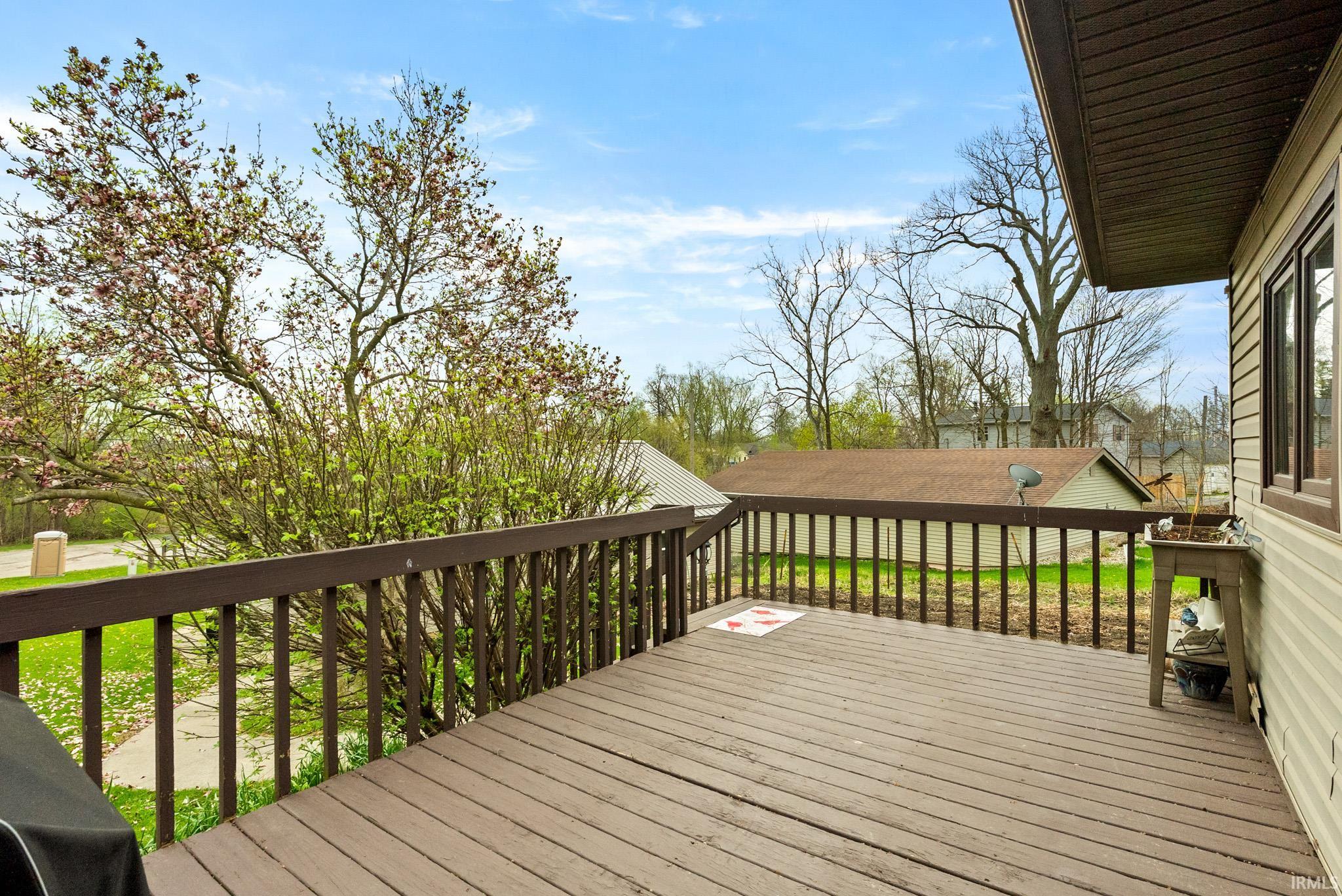 Wooden terrace with area for grilling