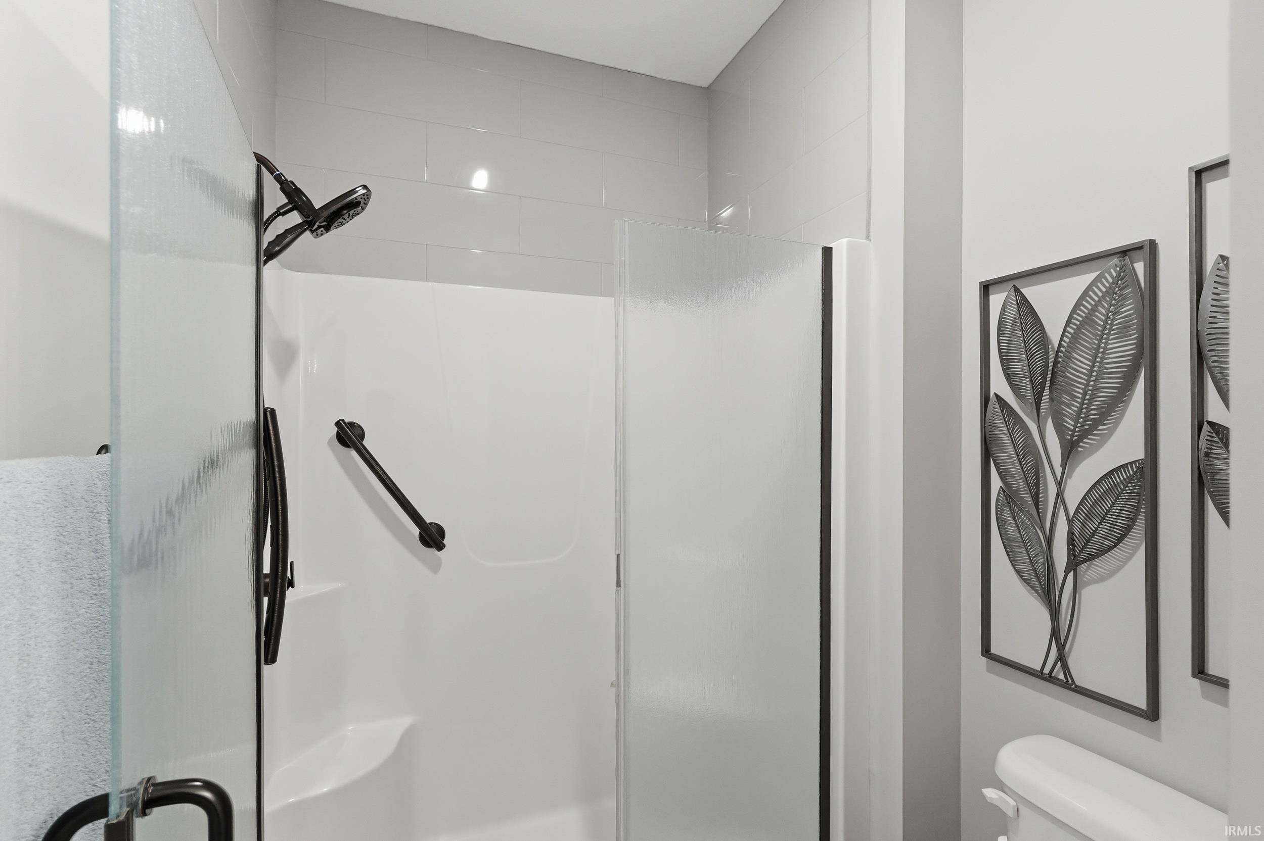 Bathroom with a stall shower