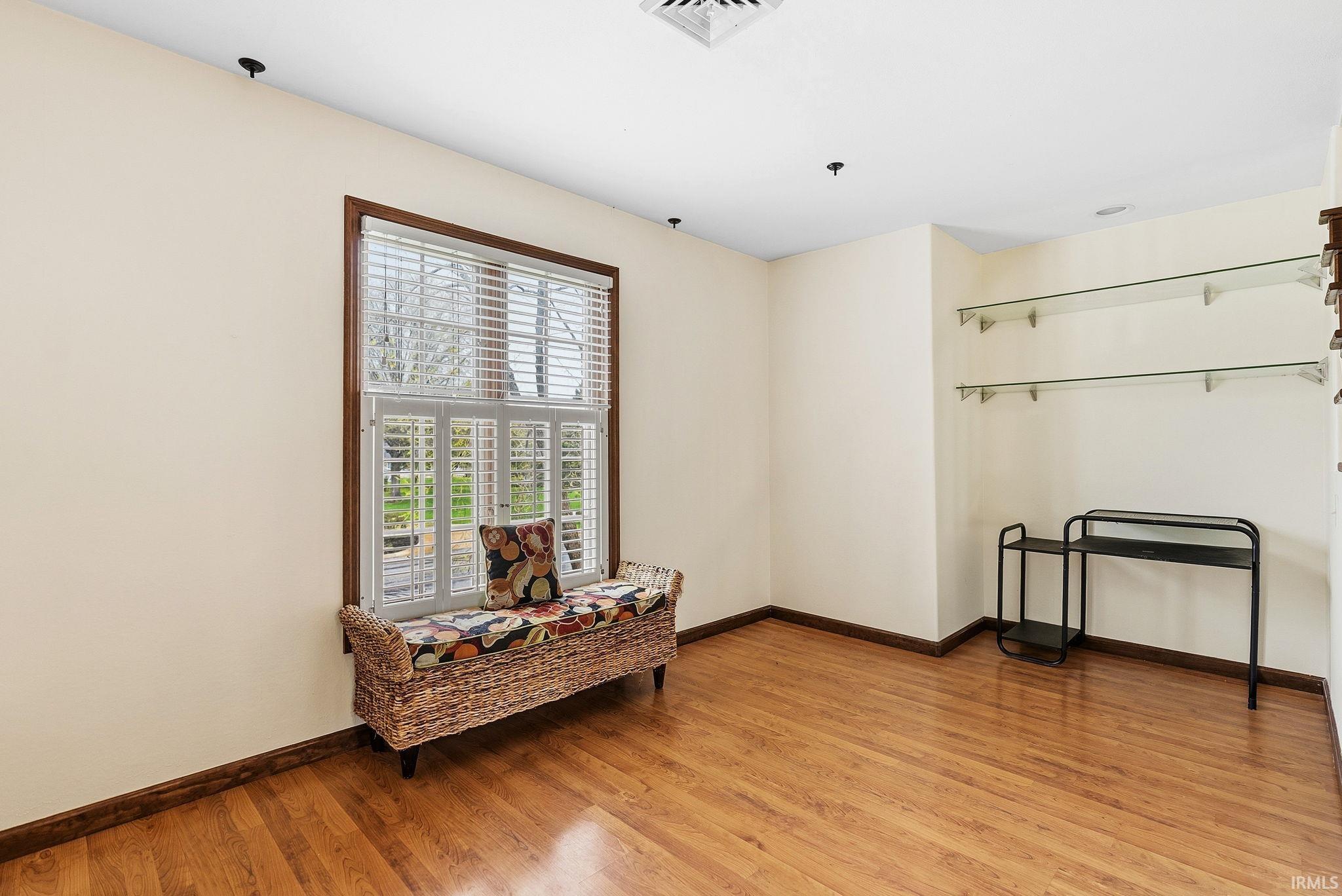 Sitting room featuring light wood-type flooring