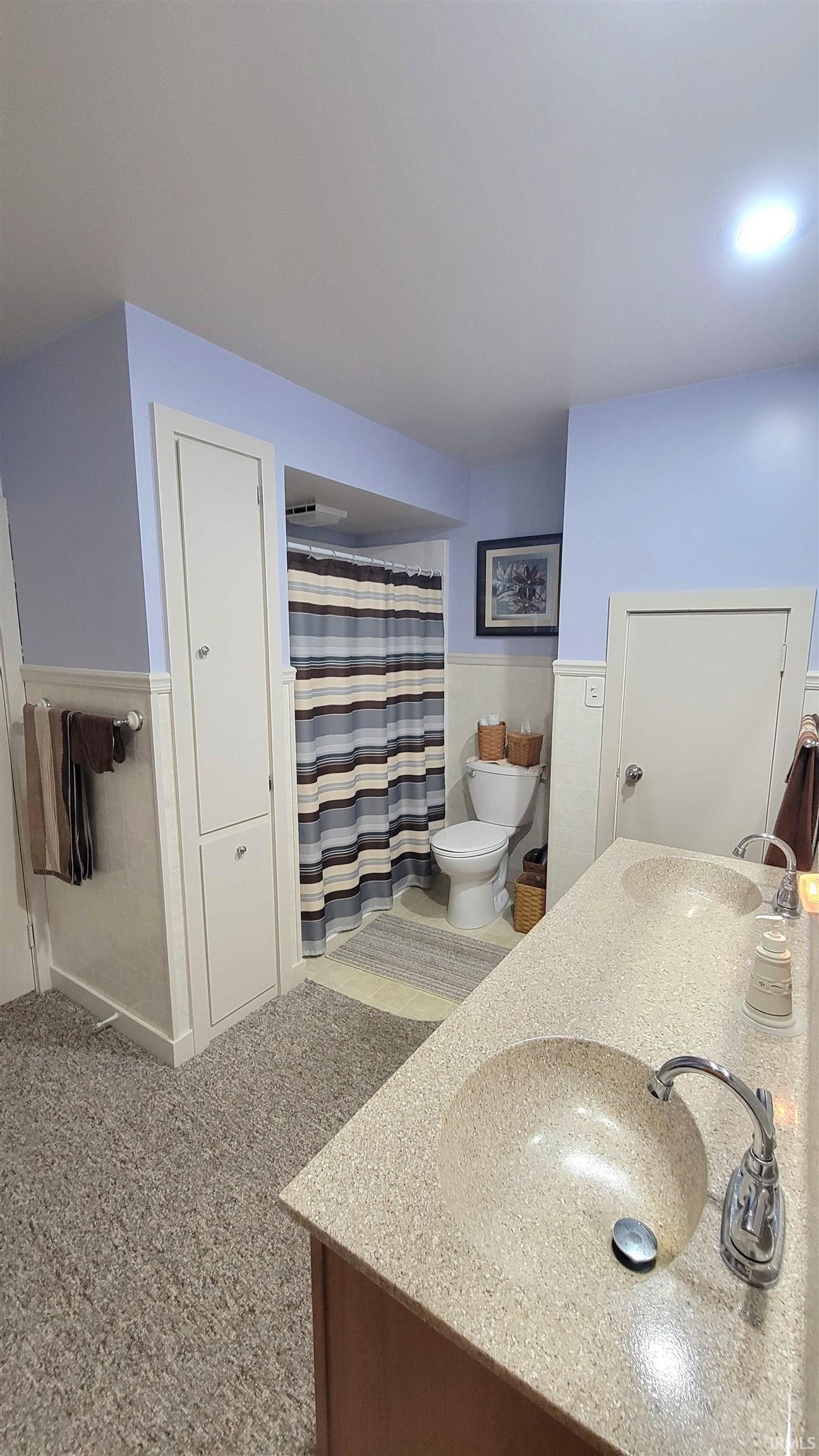 Full bath, double sinks, walk-in shower