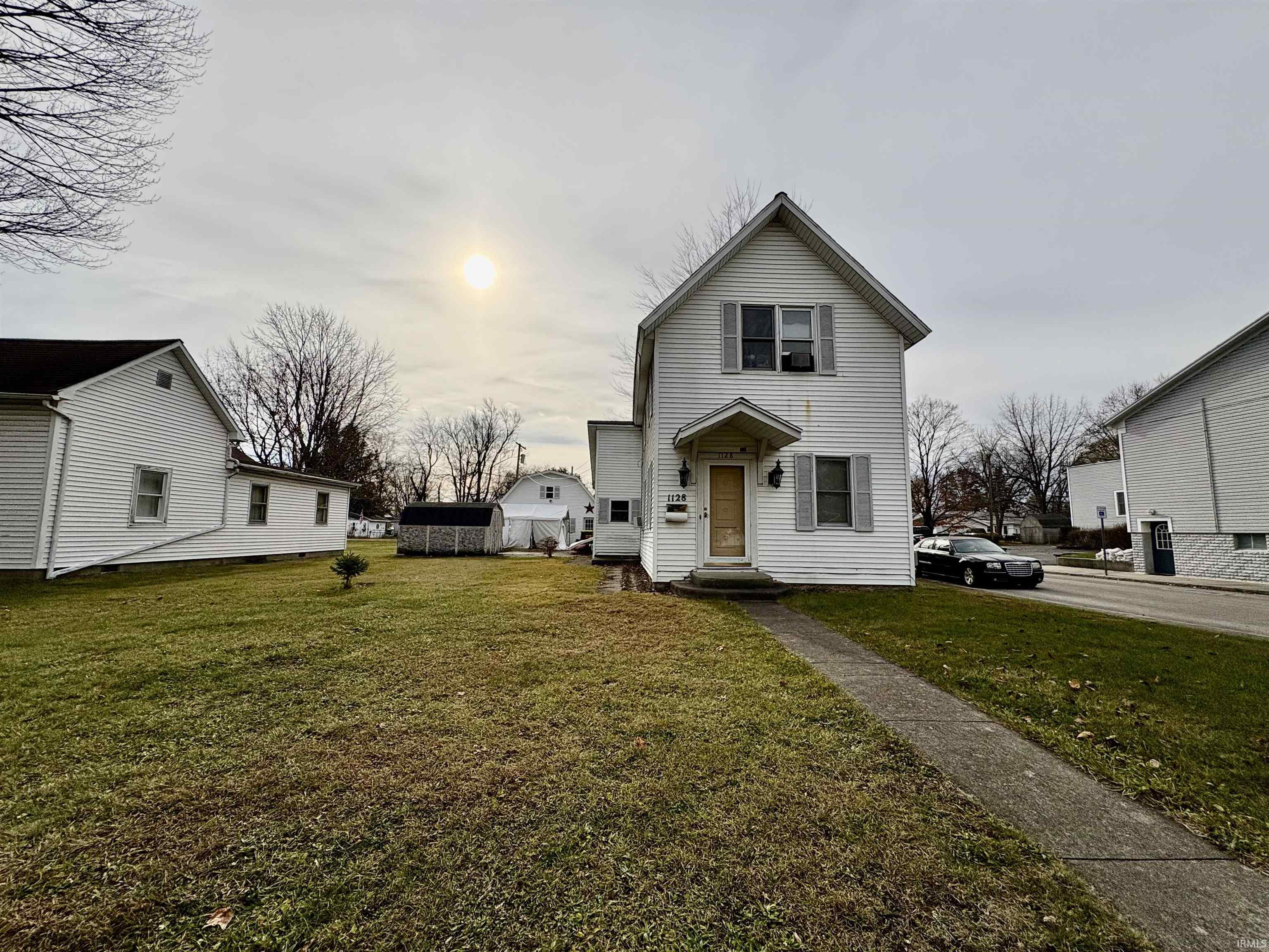 View of front of house with a front lawn