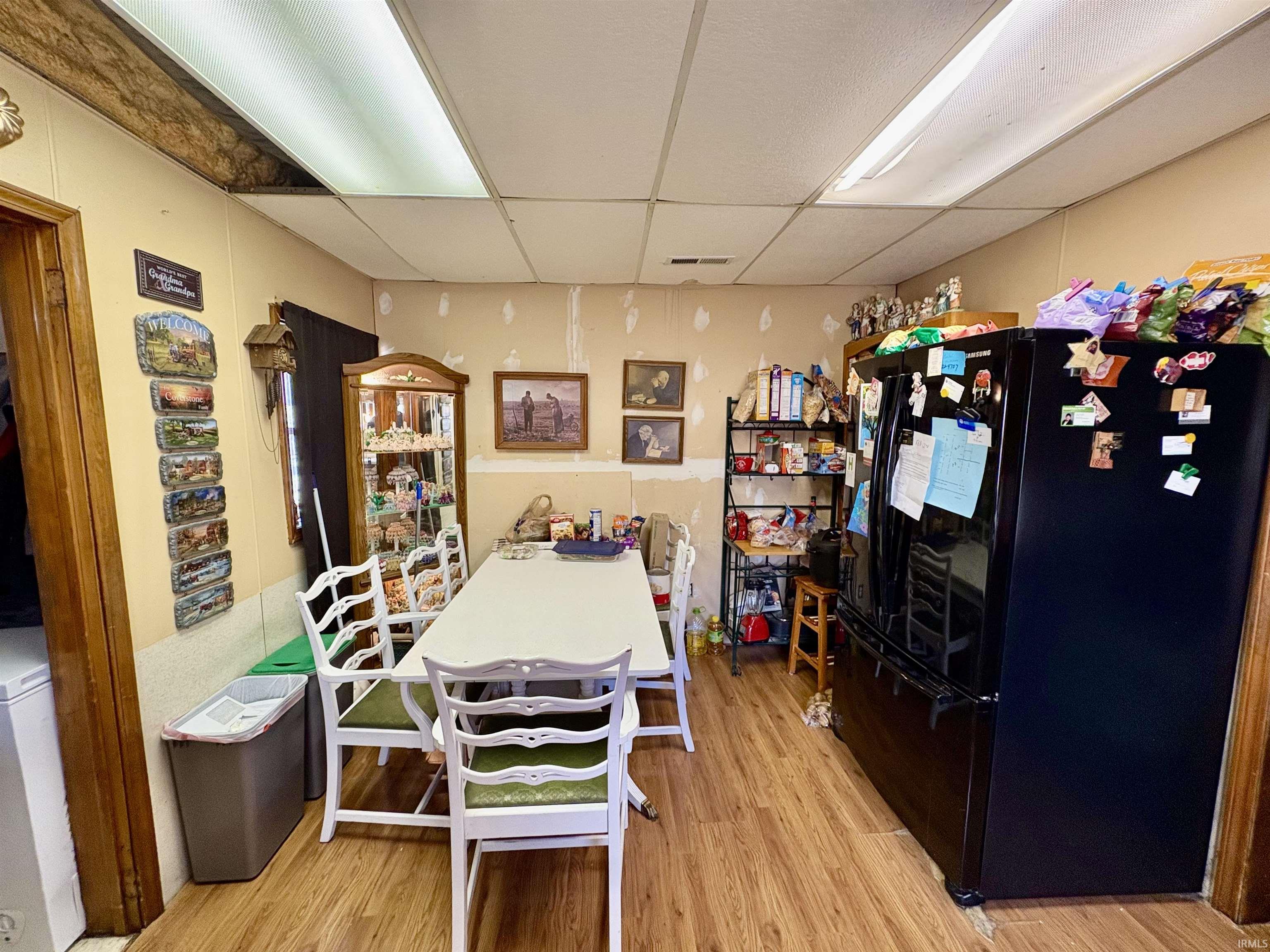 Game room with a paneled ceiling