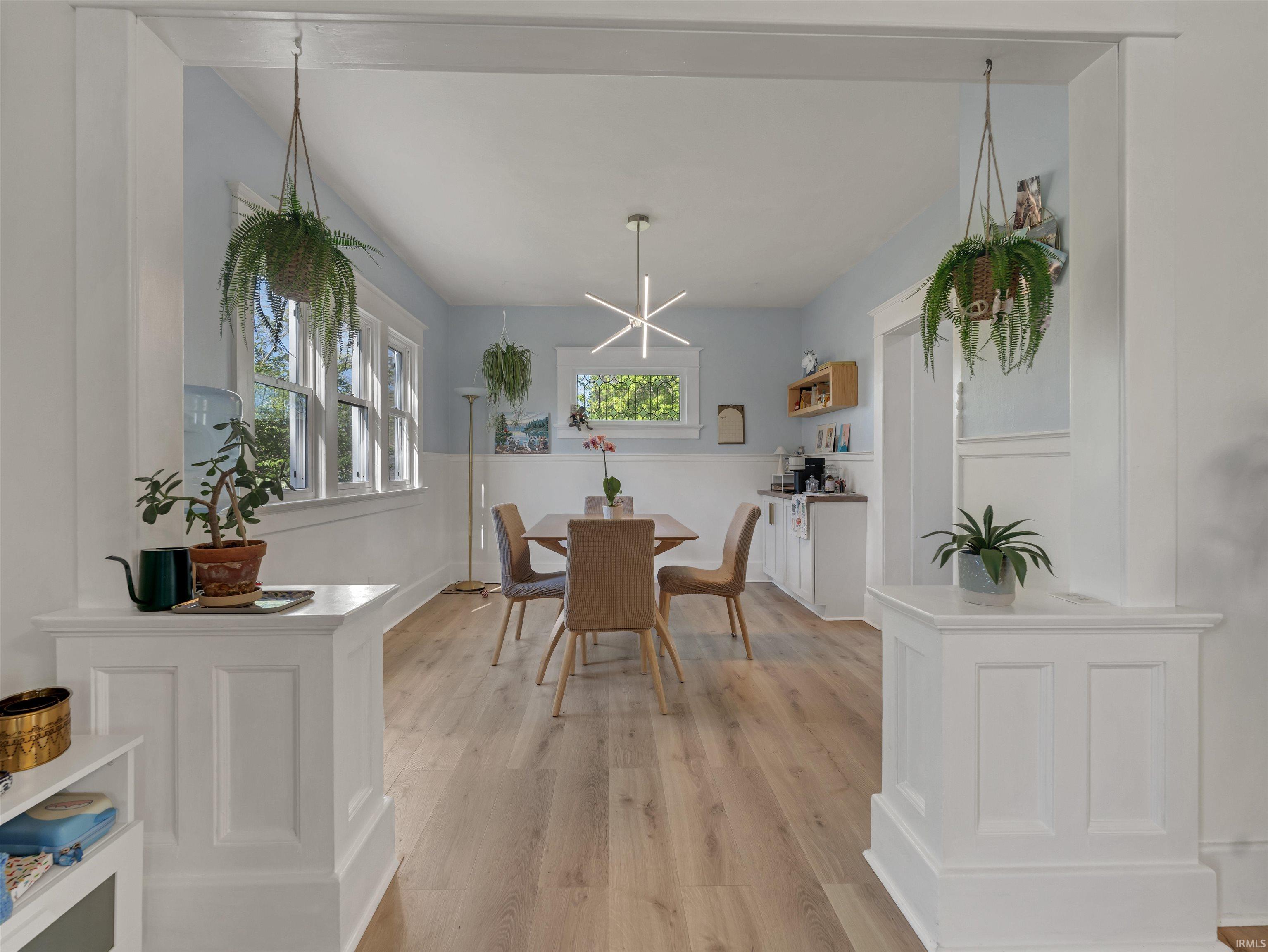 Dining space with light wood-style flooring
