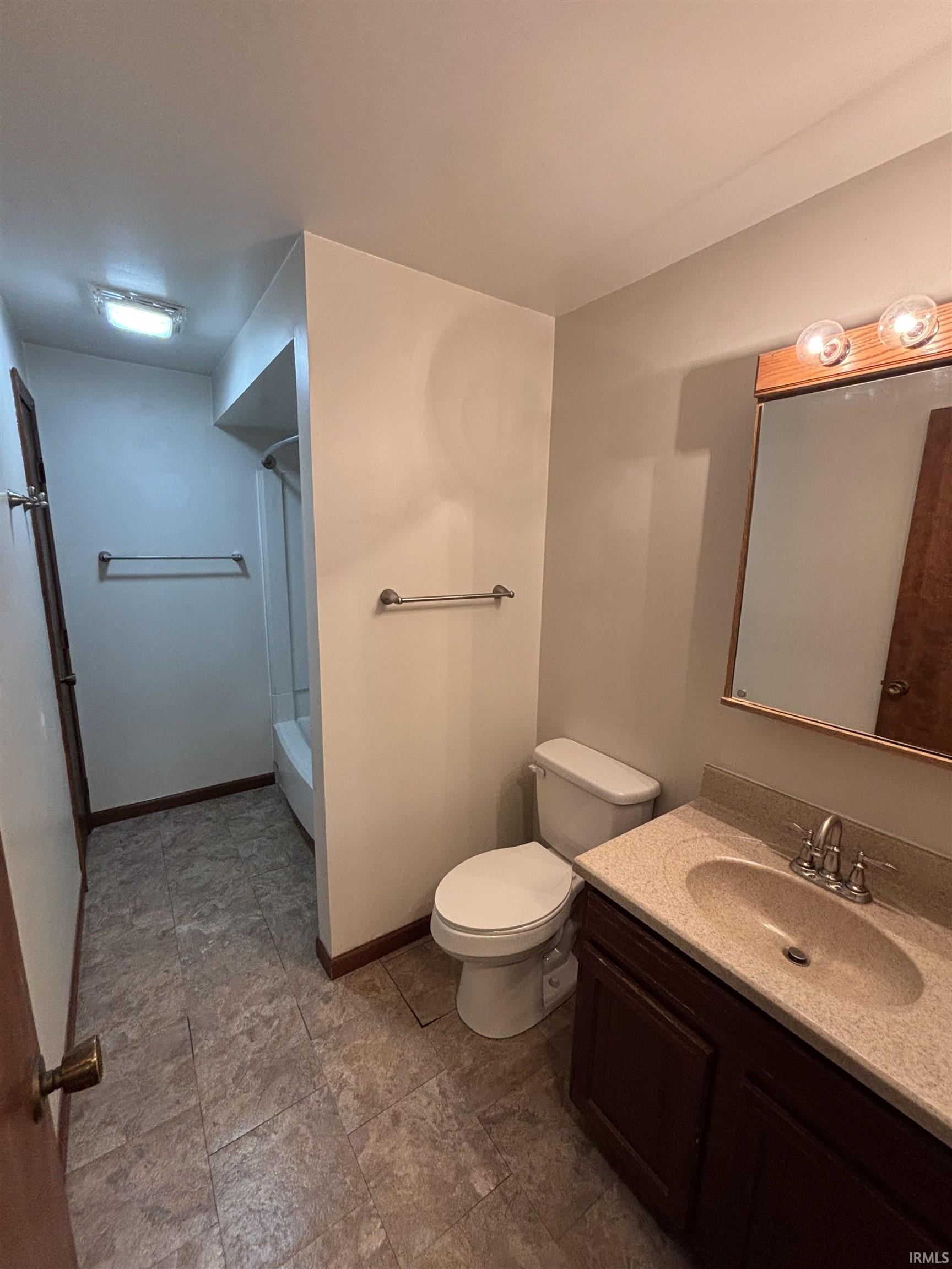 Full bath with vanity and shower / bathtub combination