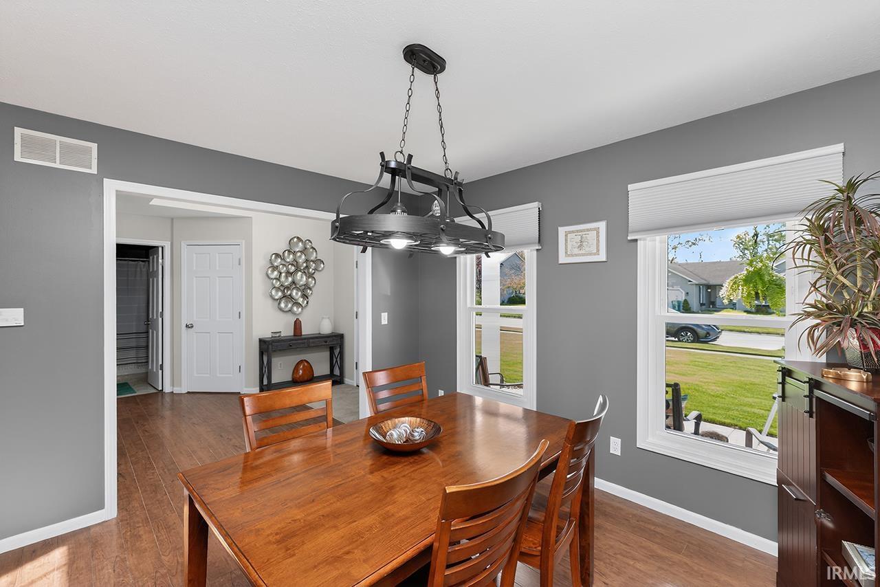 Dining space featuring wood finished floors