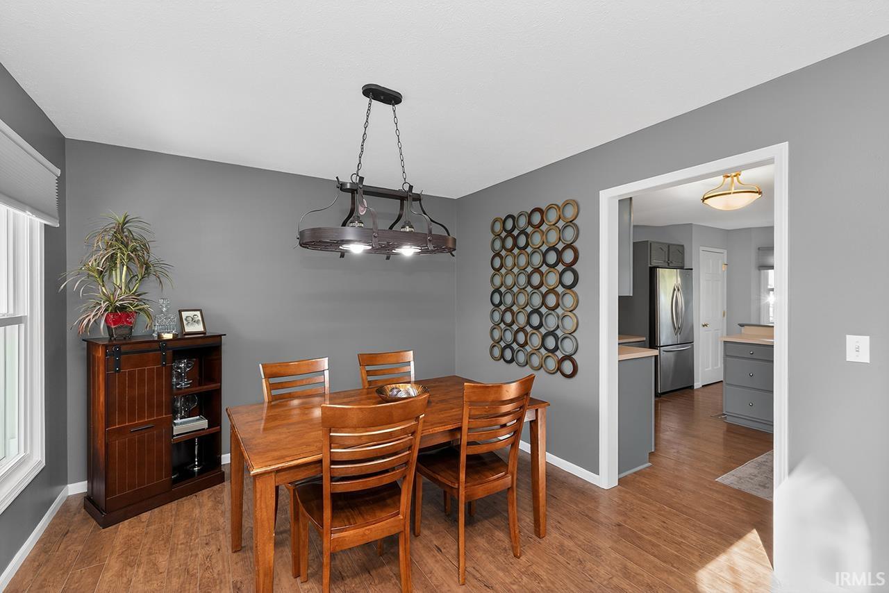 Dining space featuring light wood finished floors