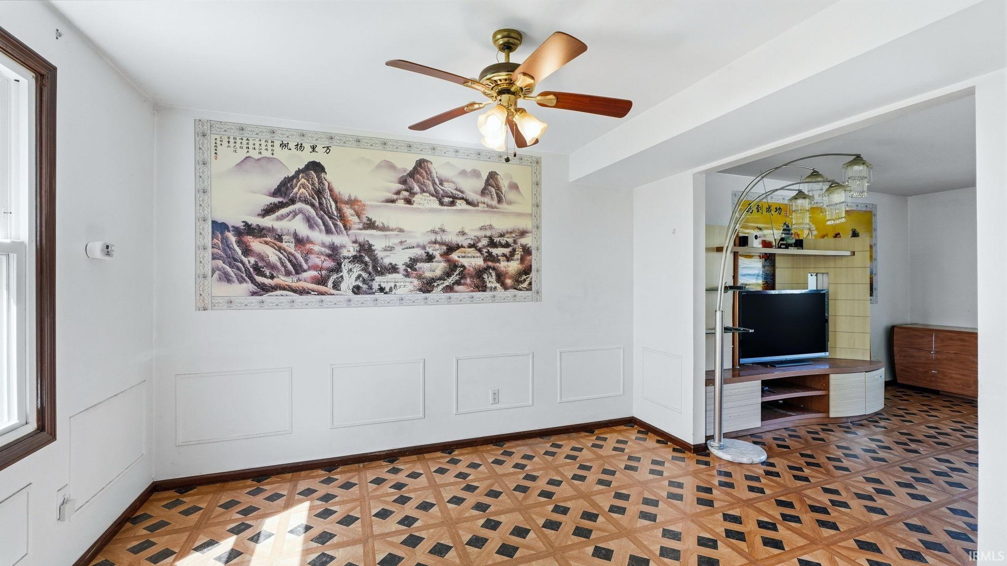 Open interior space featuring patterned wood-finish flooring