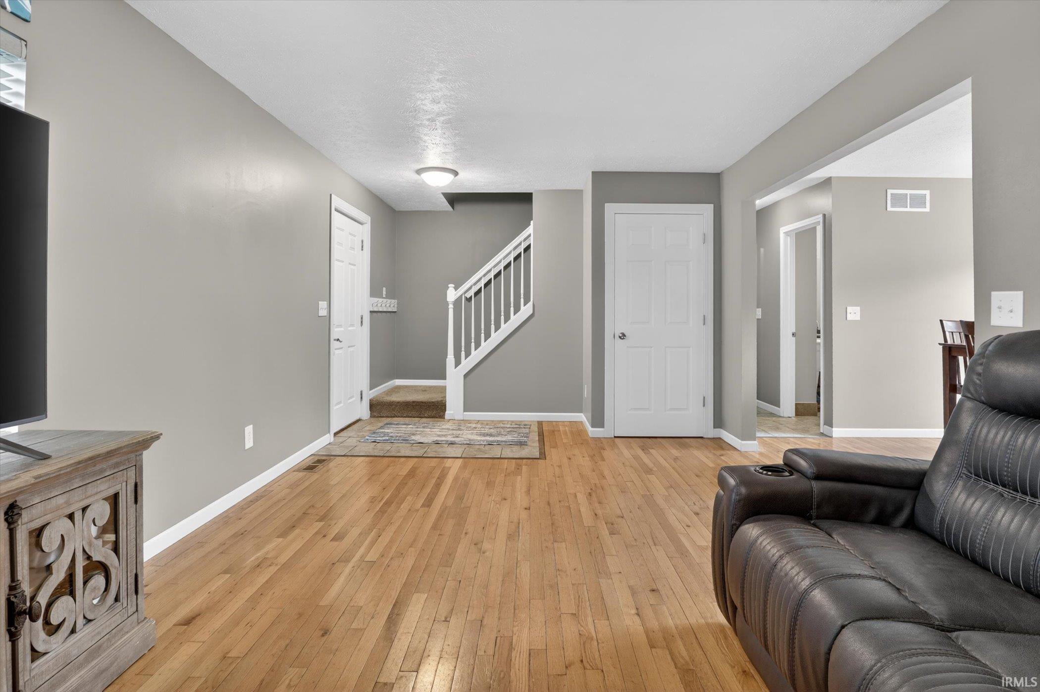 Hardwood flooring throughout the main living area