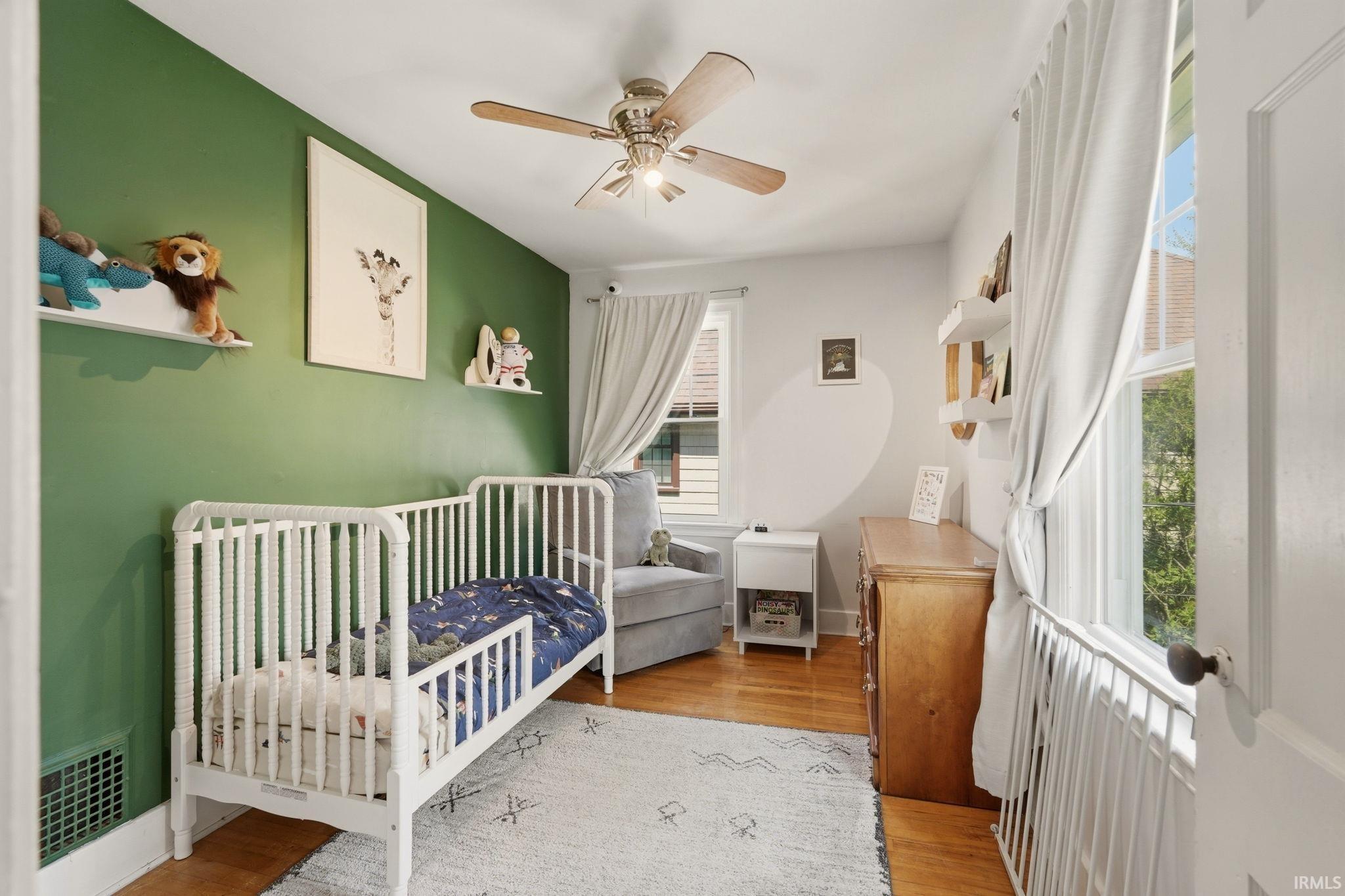 Hardwood flooring complemented by a contrasting accent wall