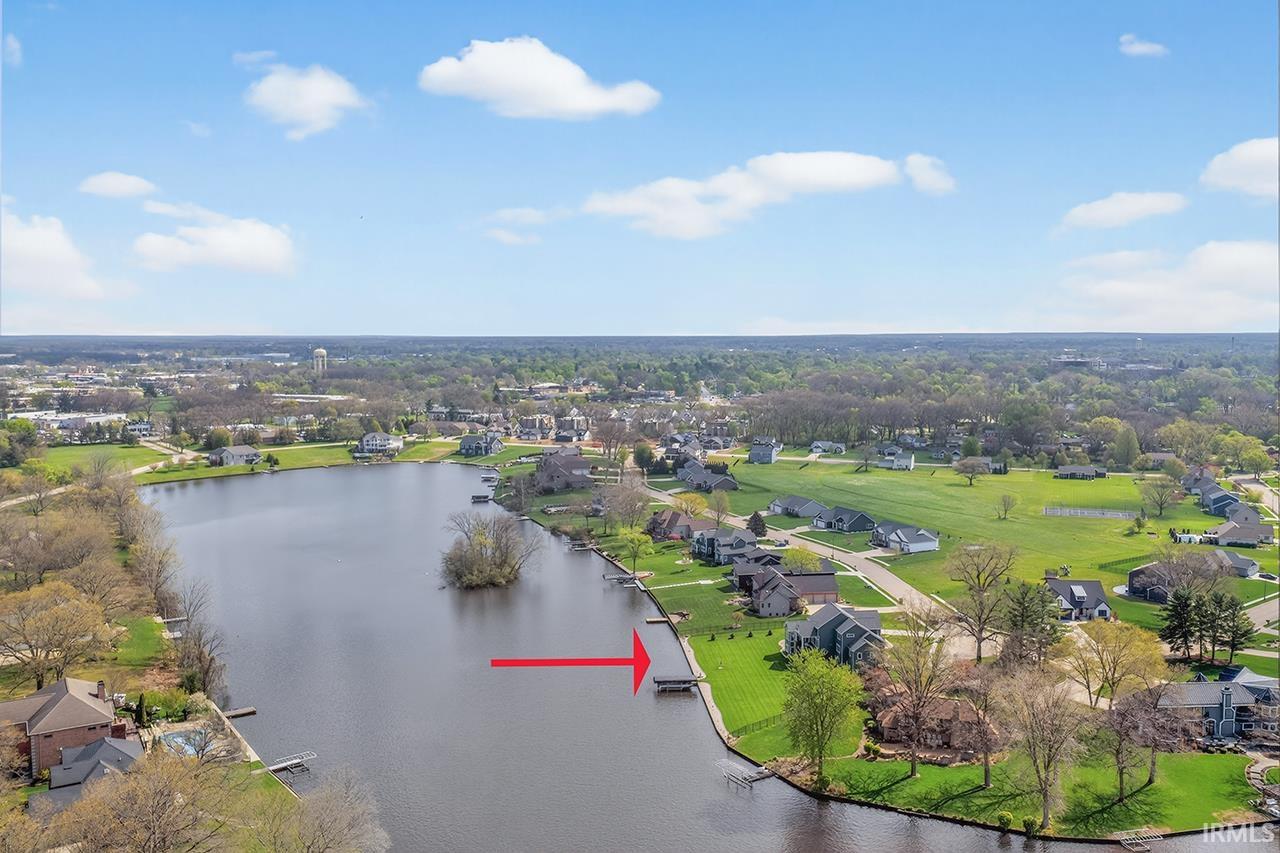 Lakefront property featuring direct water access and a private dock