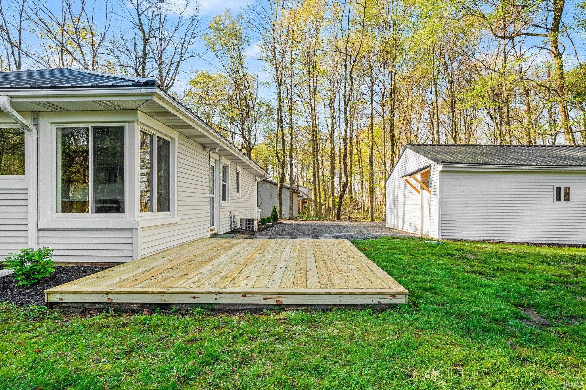 Newly constructed wood deck providing outdoor living space