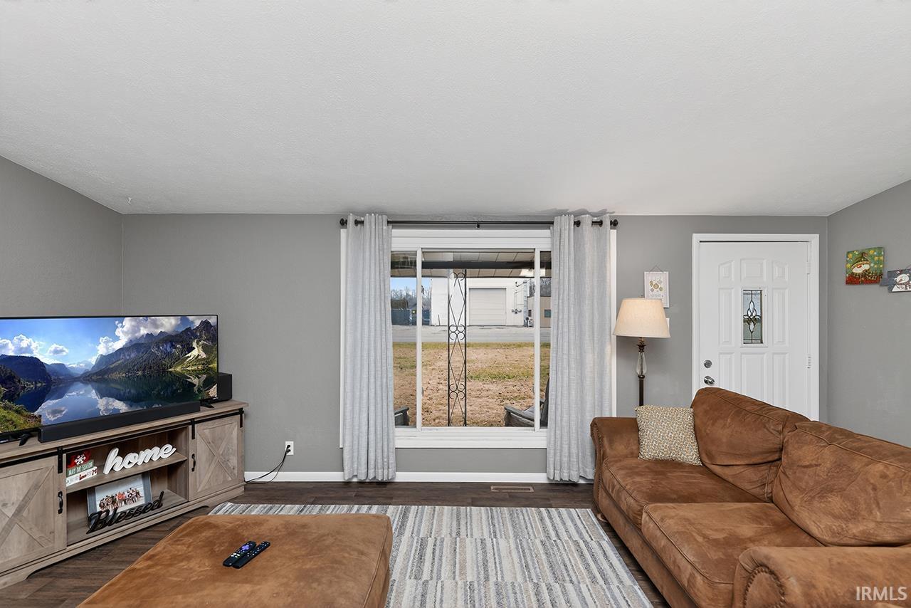 Living room with wood finished floors