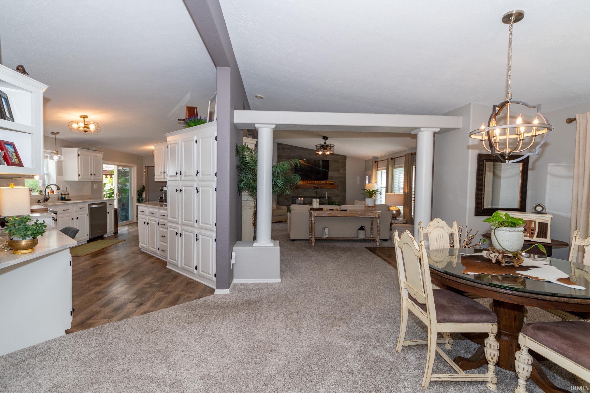 Open-concept main living area with a defined dining space and kitchen