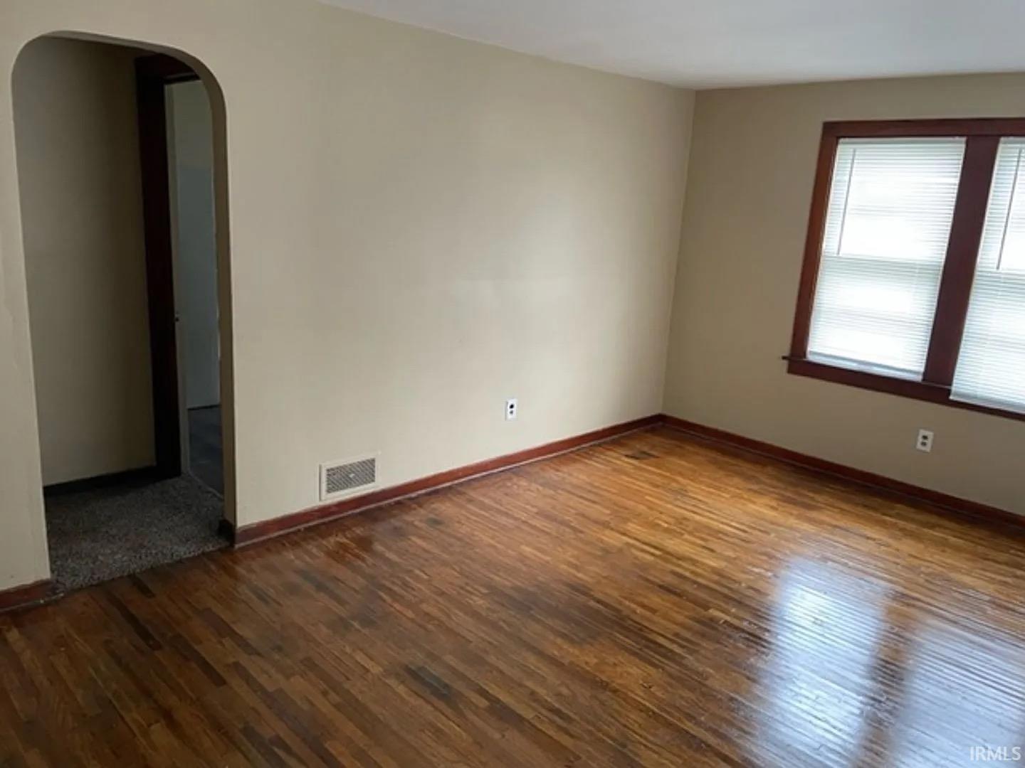 Hardwood flooring throughout the space