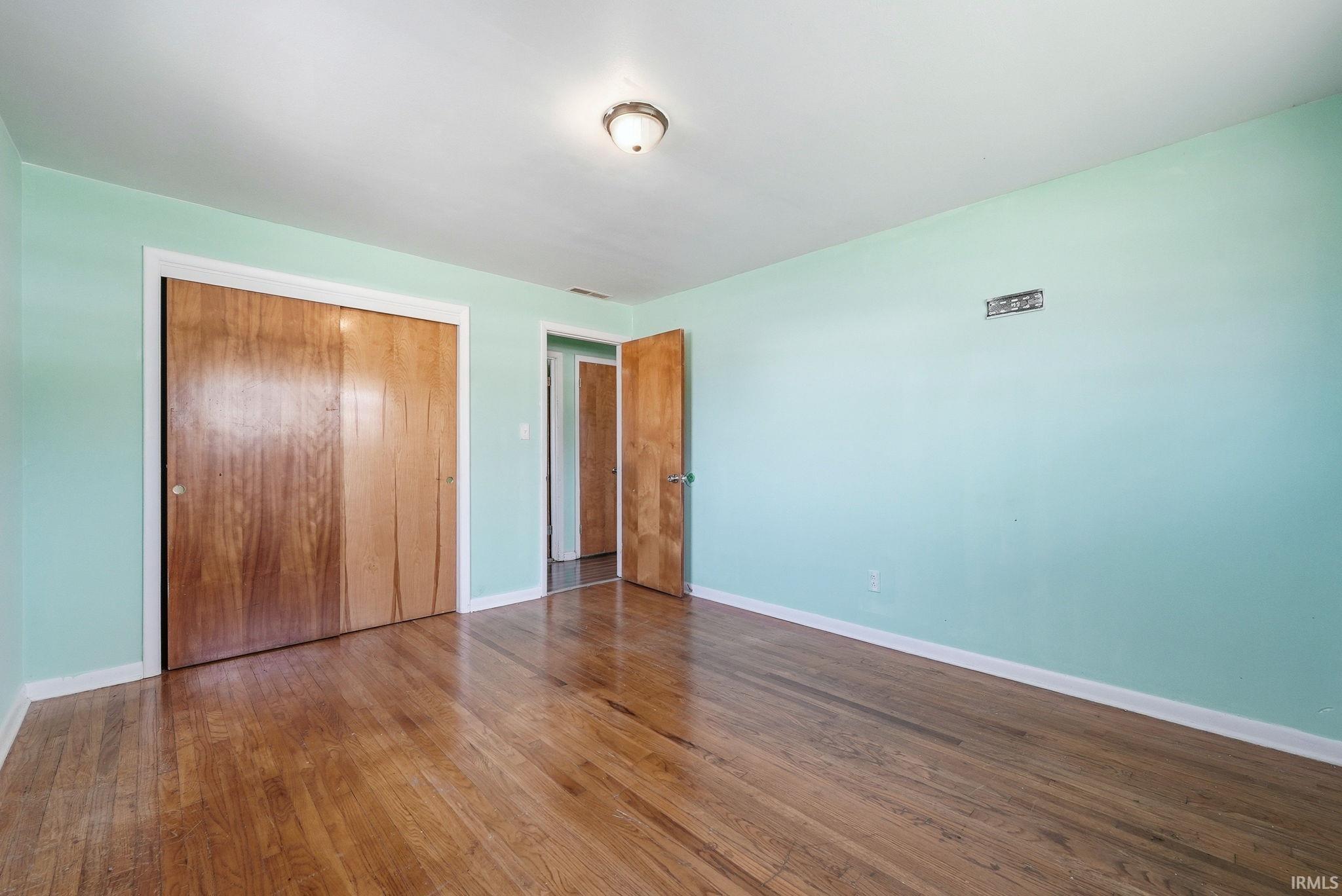 Wood-finish flooring throughout