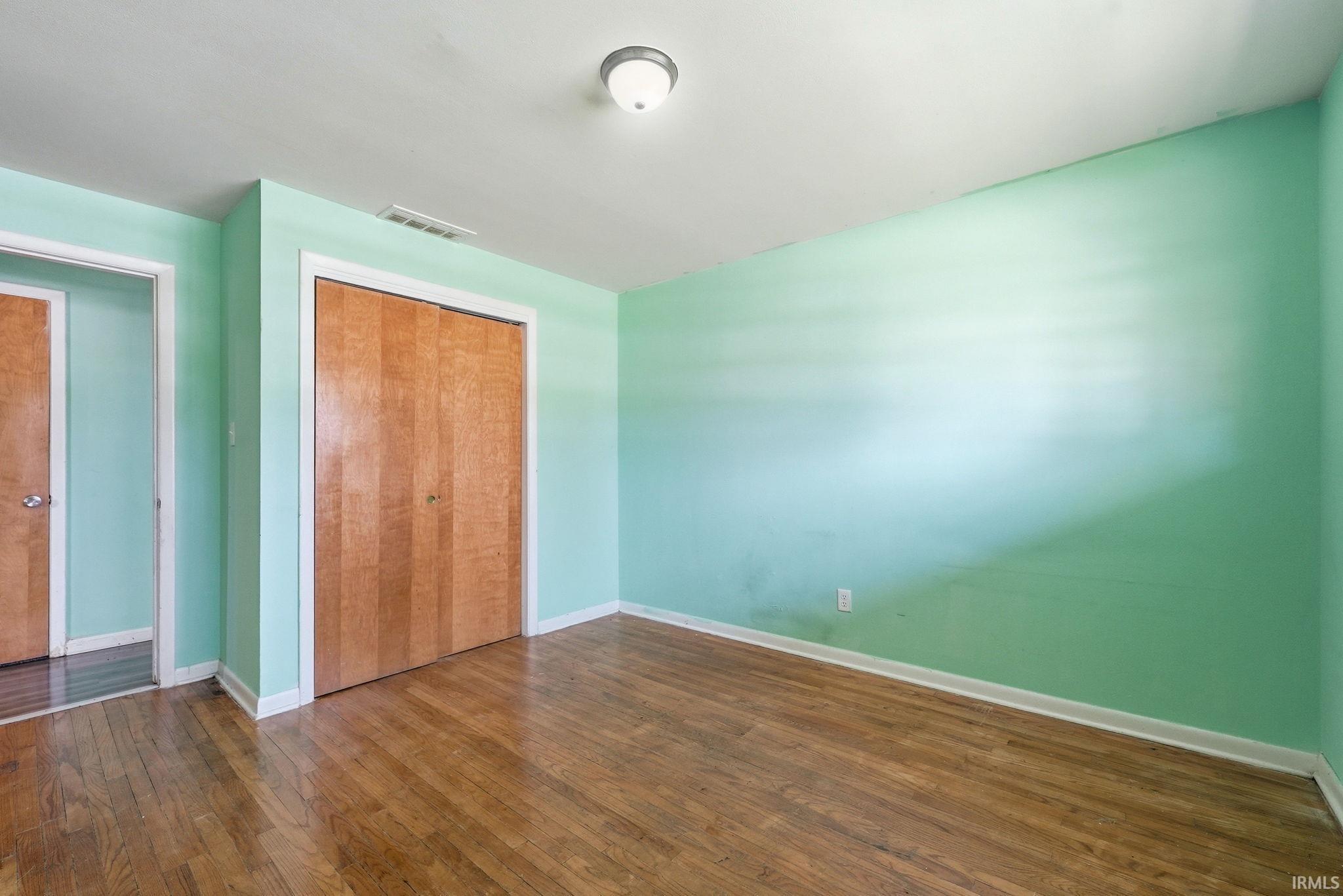 Hardwood-style flooring throughout