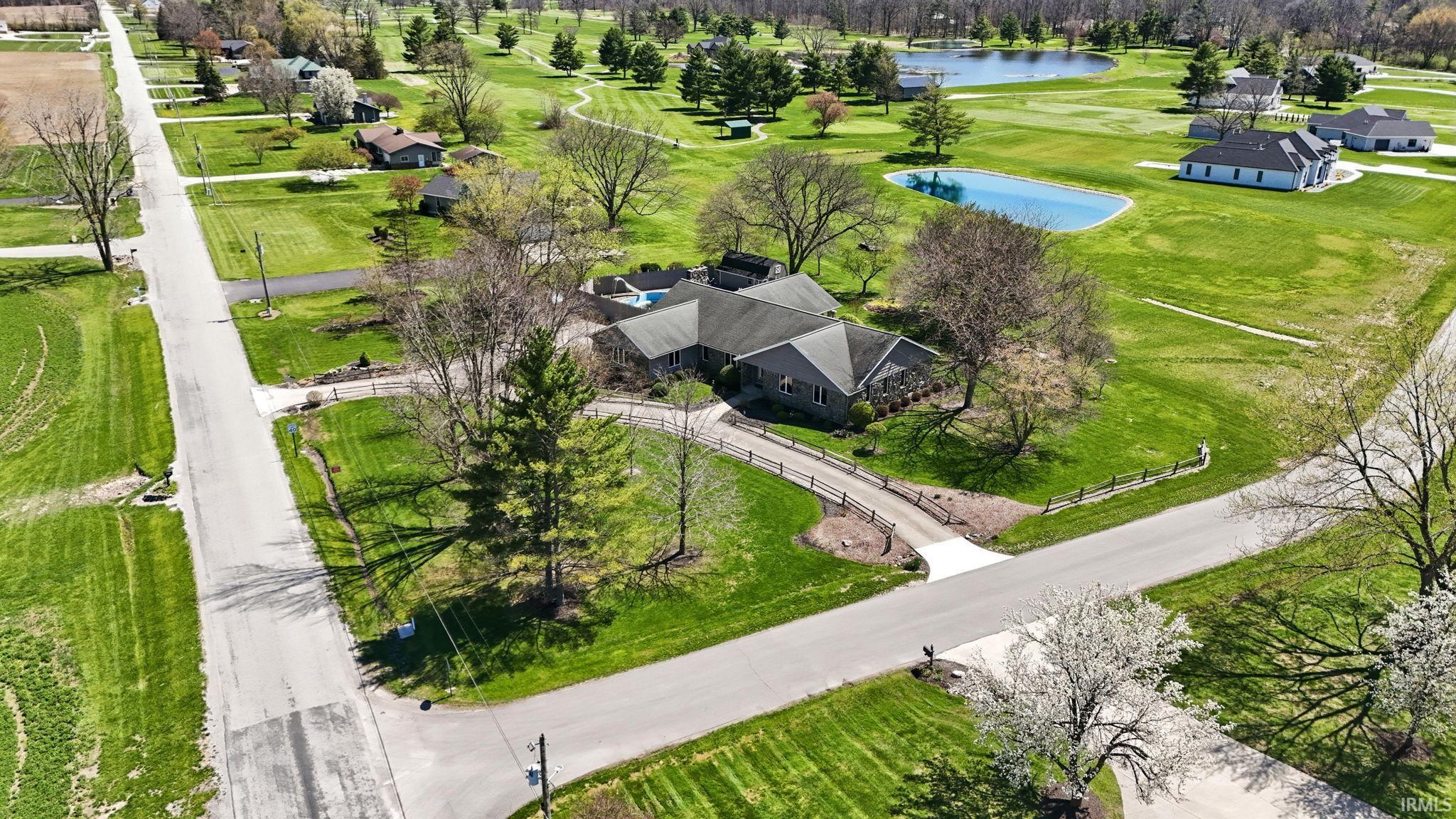 Aerial view of a large body of water and a golf course