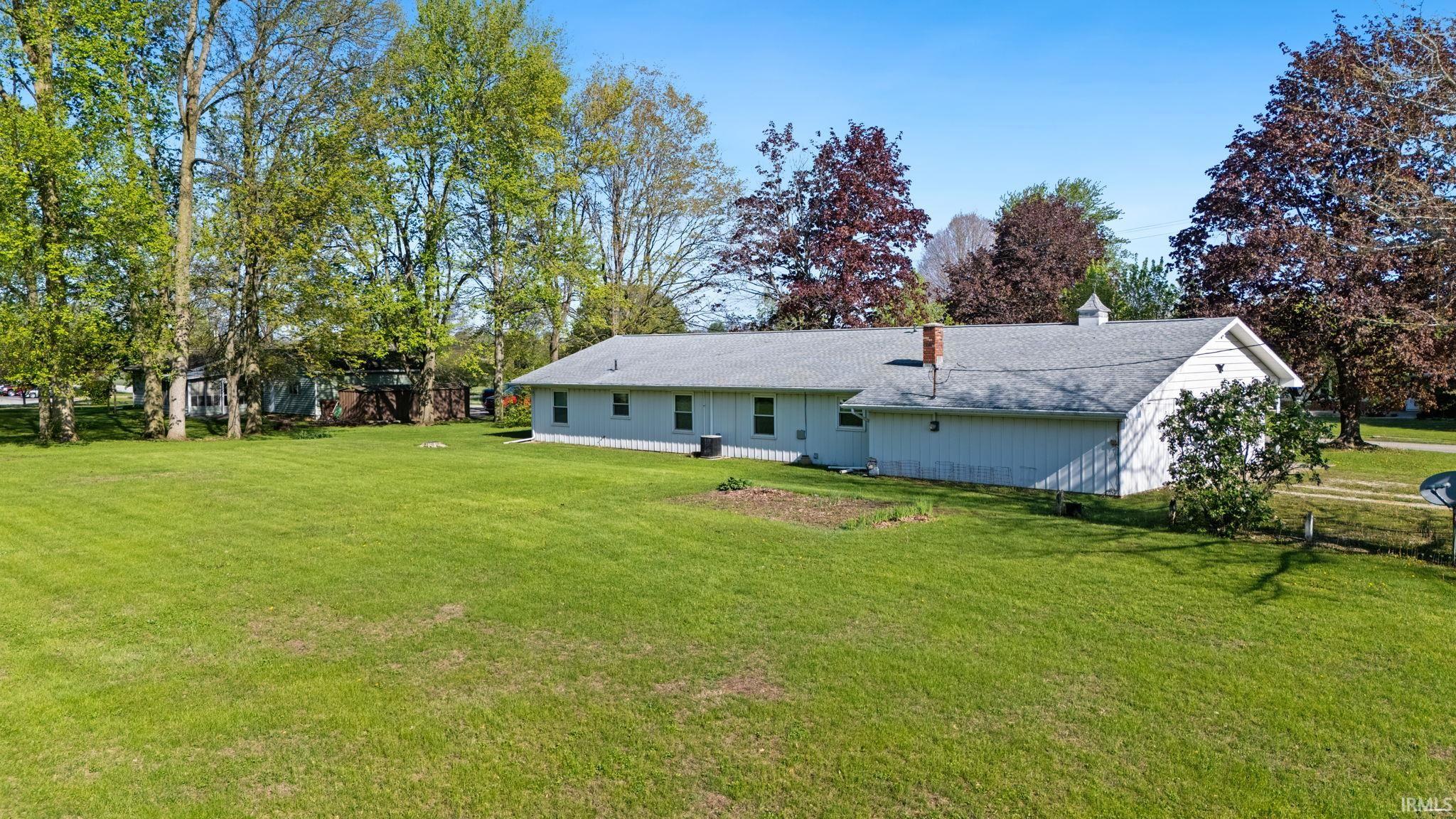 Expansive green lawn providing ample outdoor space