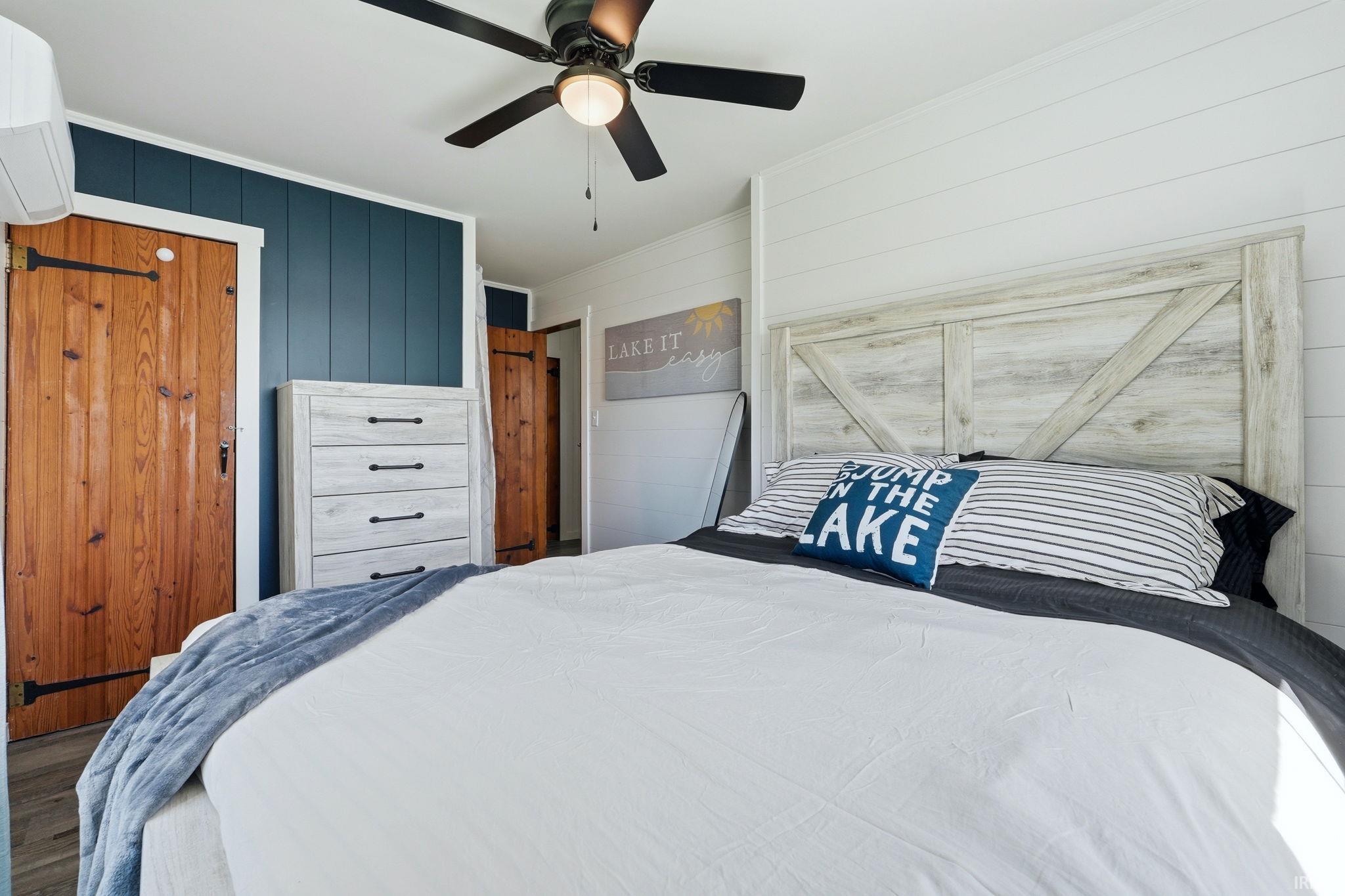 Interior space featuring wood-finish flooring and a ceiling fan