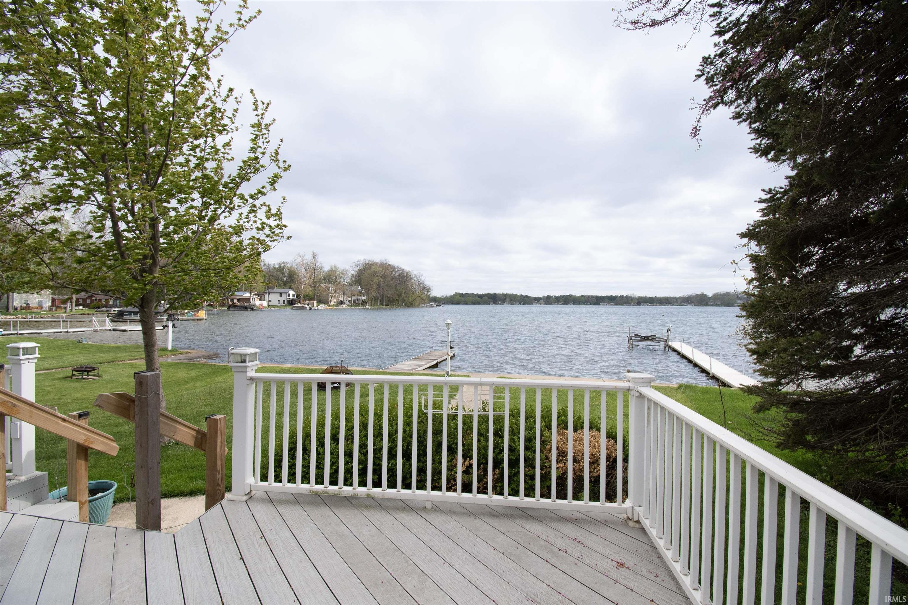 Expansive deck featuring composite decking and white railings