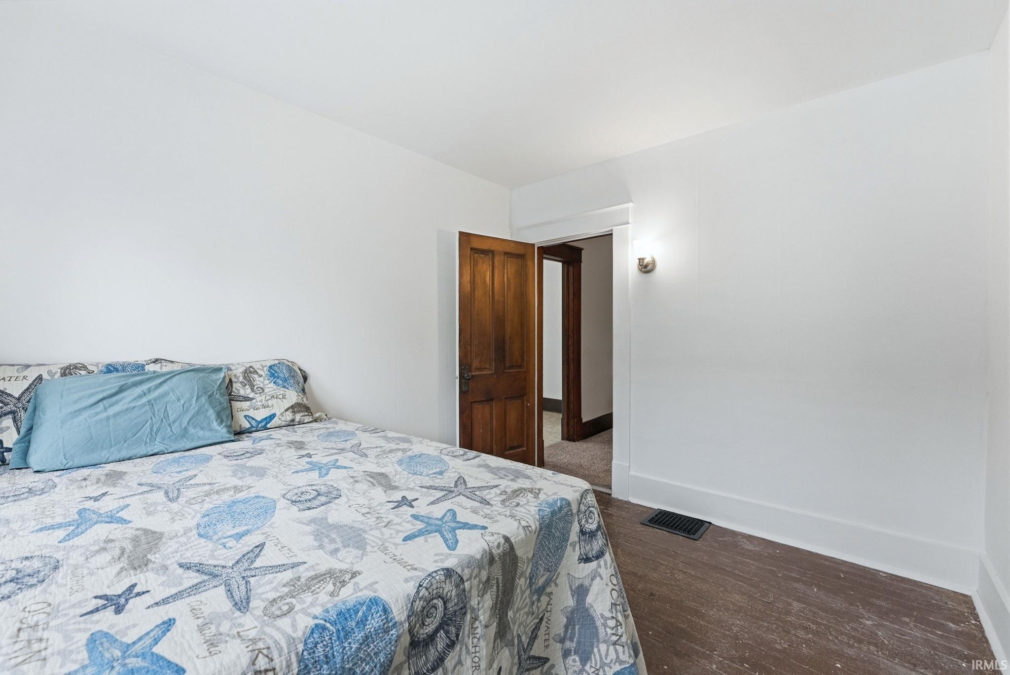 Bright white walls with wide baseboards
