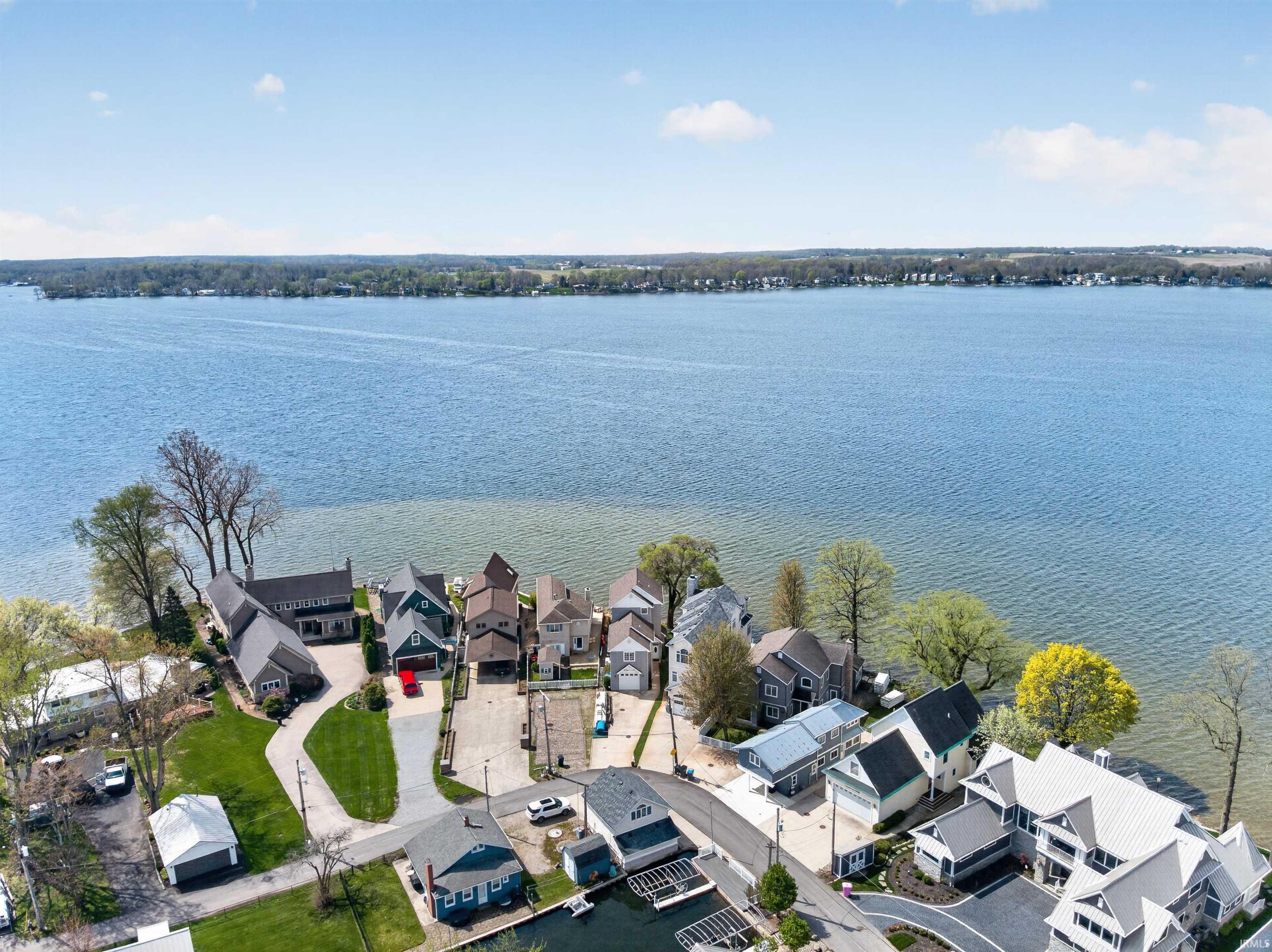 Aerial view of residential area with a nearby body of water