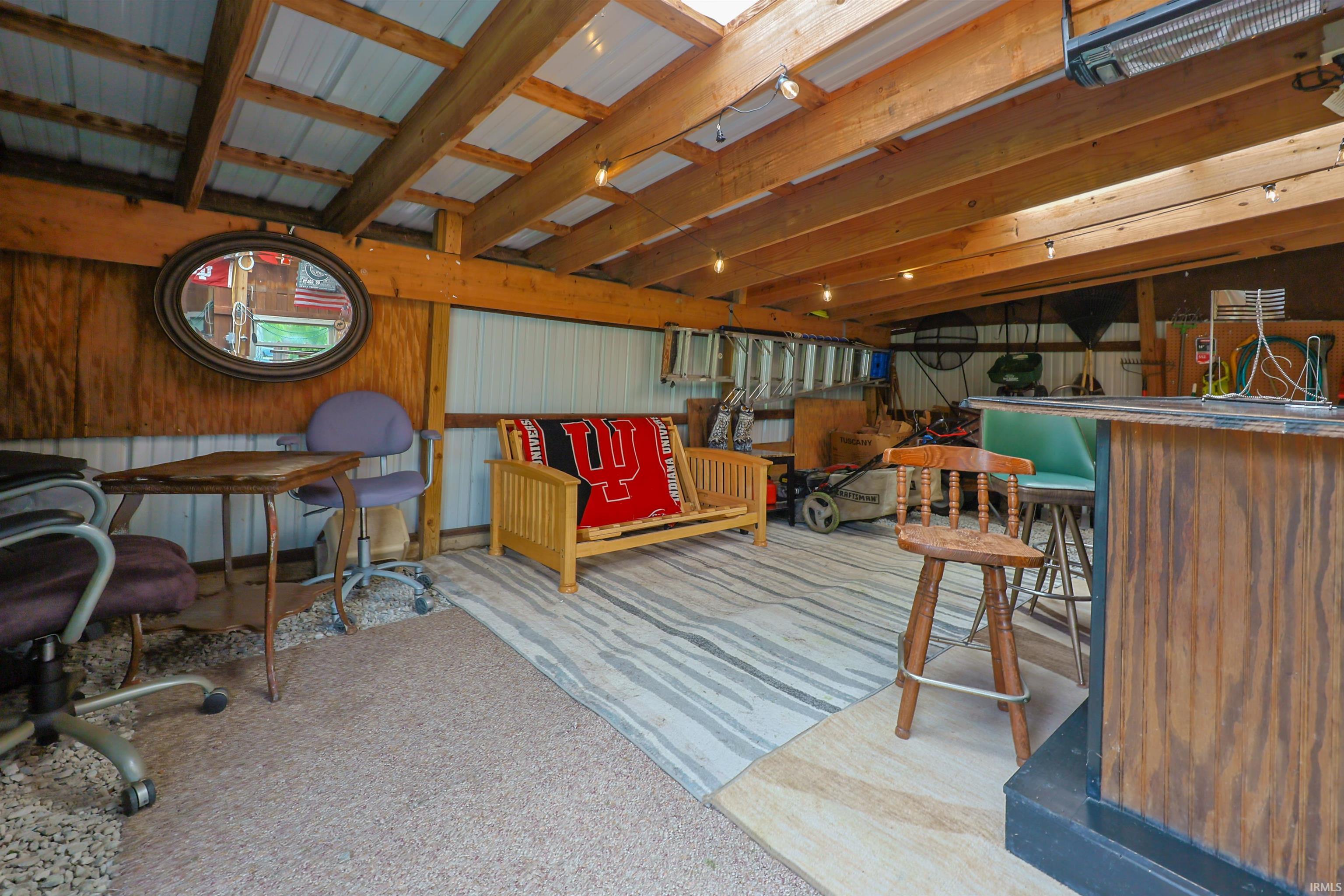 Exposed wood beam ceiling with recessed lighting