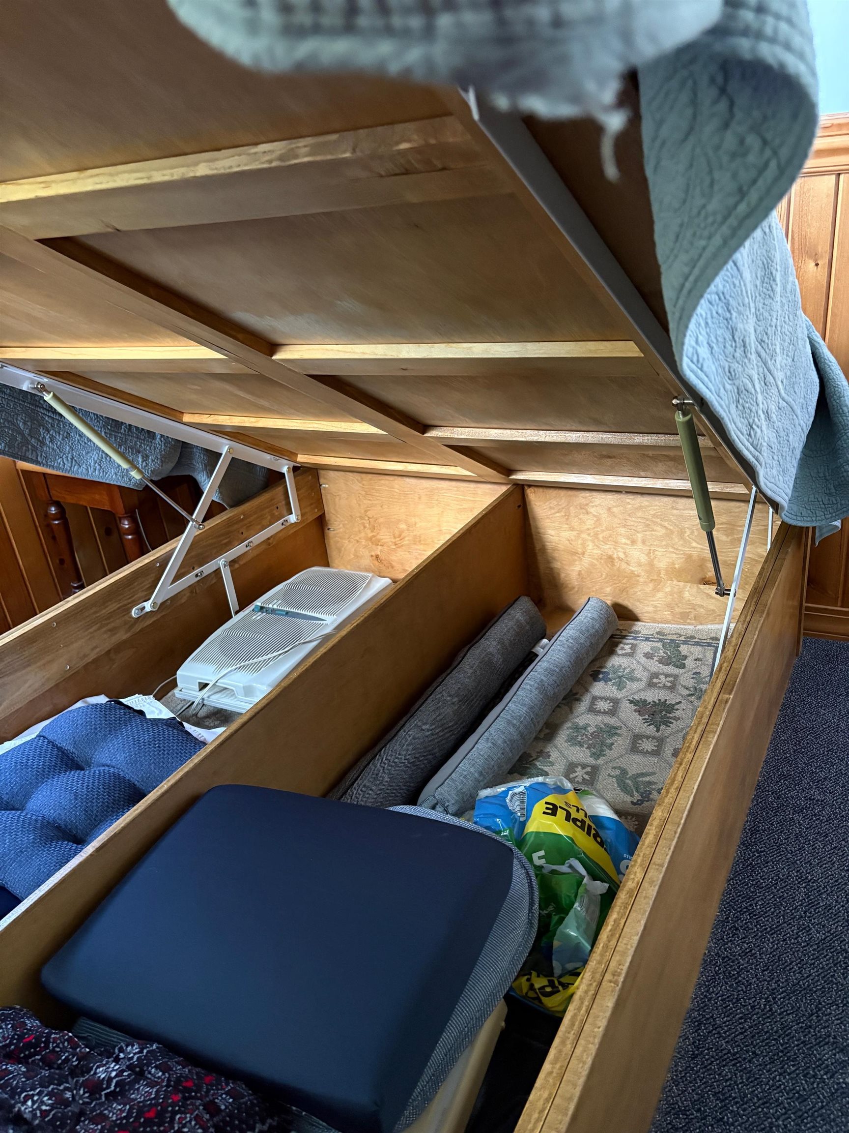 THE PLATFORM BED LIFTS UP FOR STORAGE!