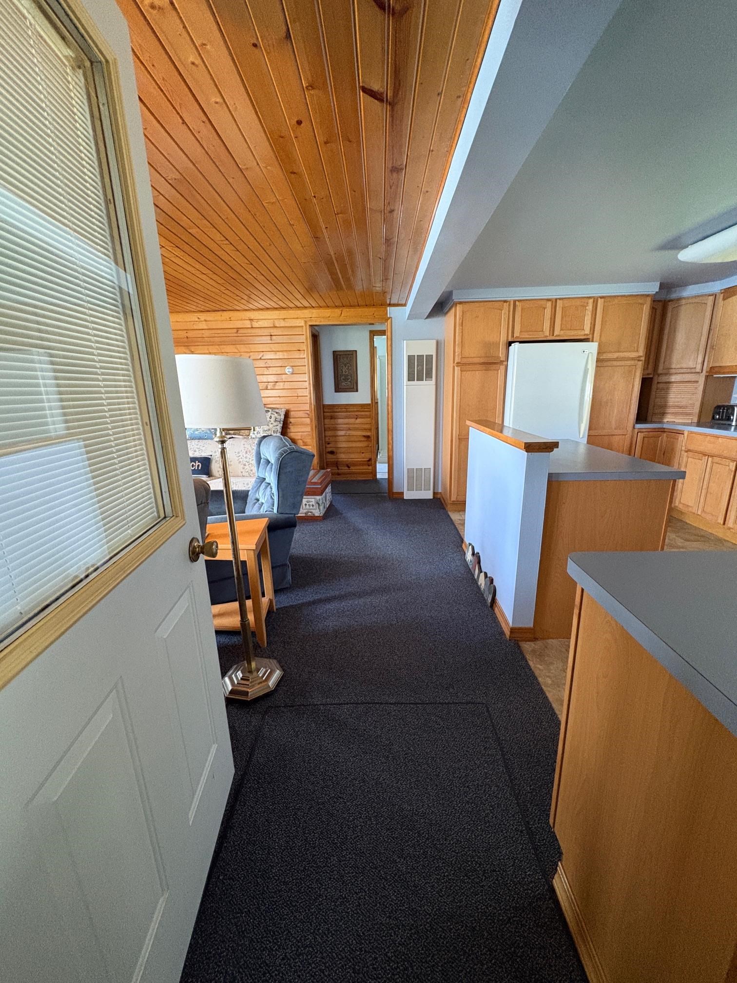 TO KITCHEN AND LIVING ROOM FROM LAUNDRY/MUDROOM