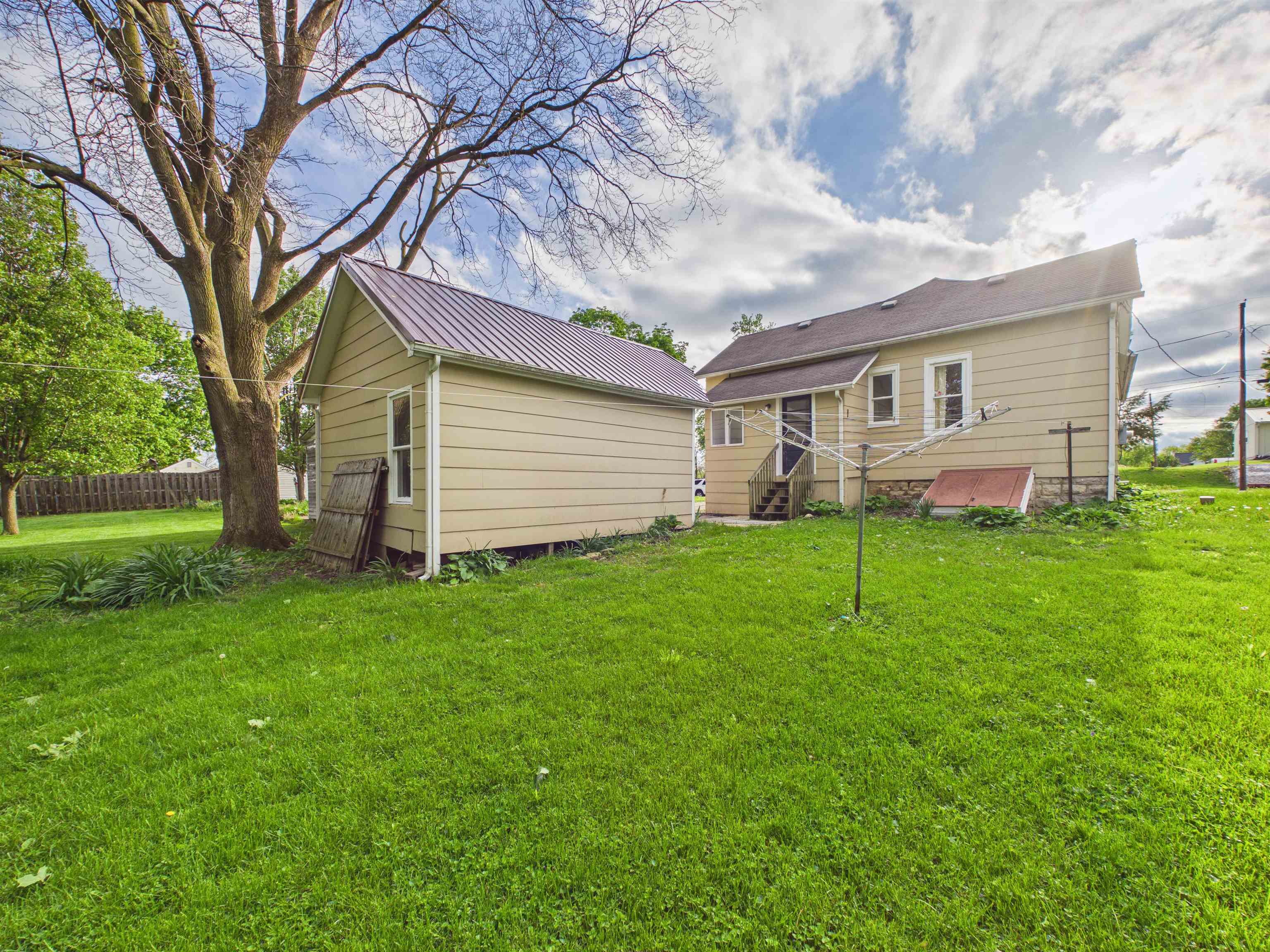 Expansive green lawn providing ample outdoor space