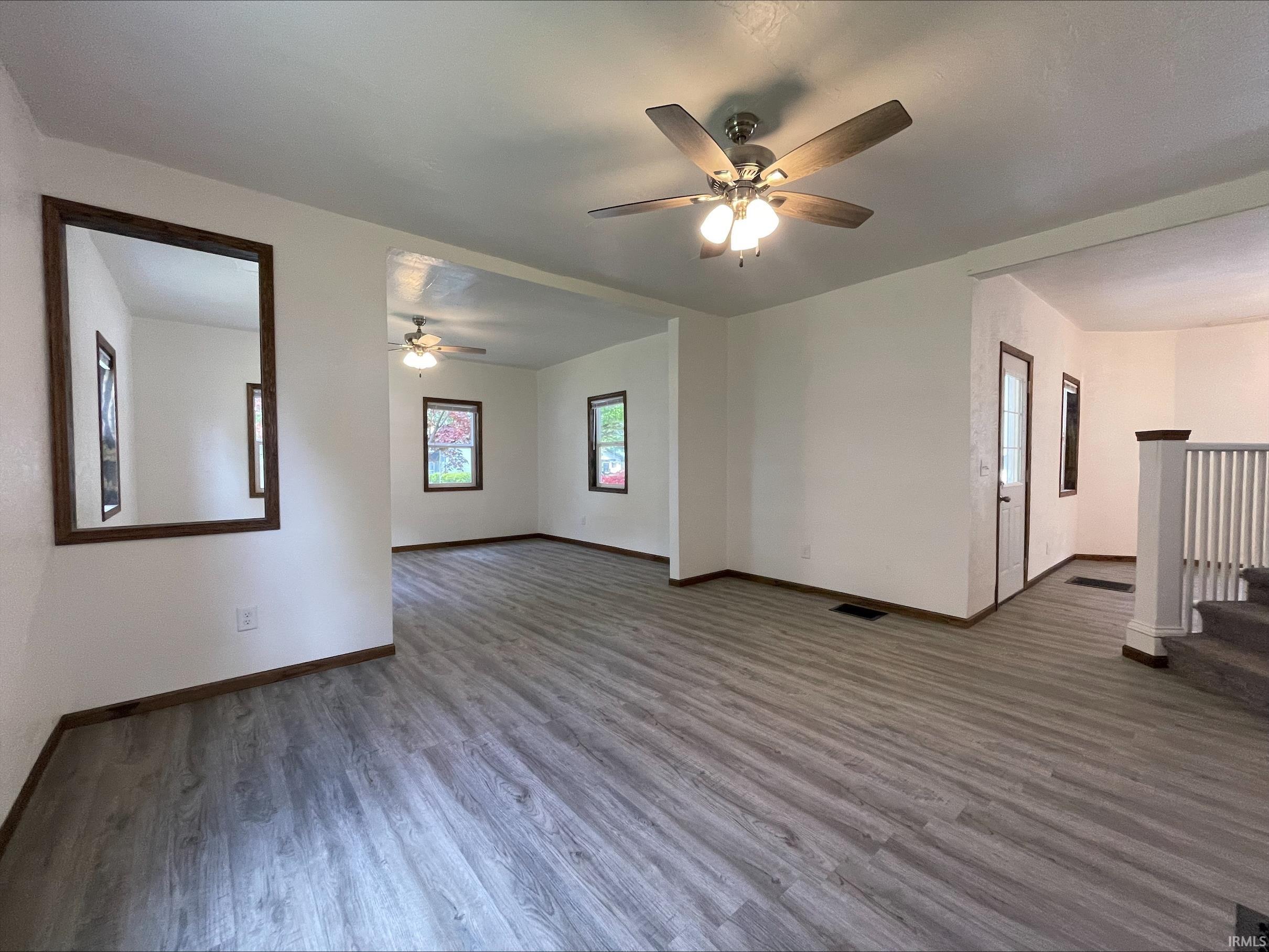 Spacious interior featuring wood-finish flooring throughout