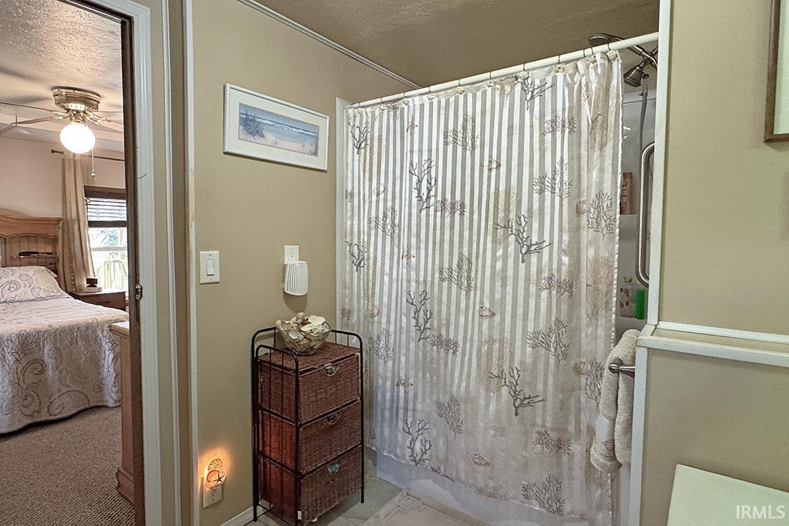 Full bathroom with a tub/shower combination and a single towel bar