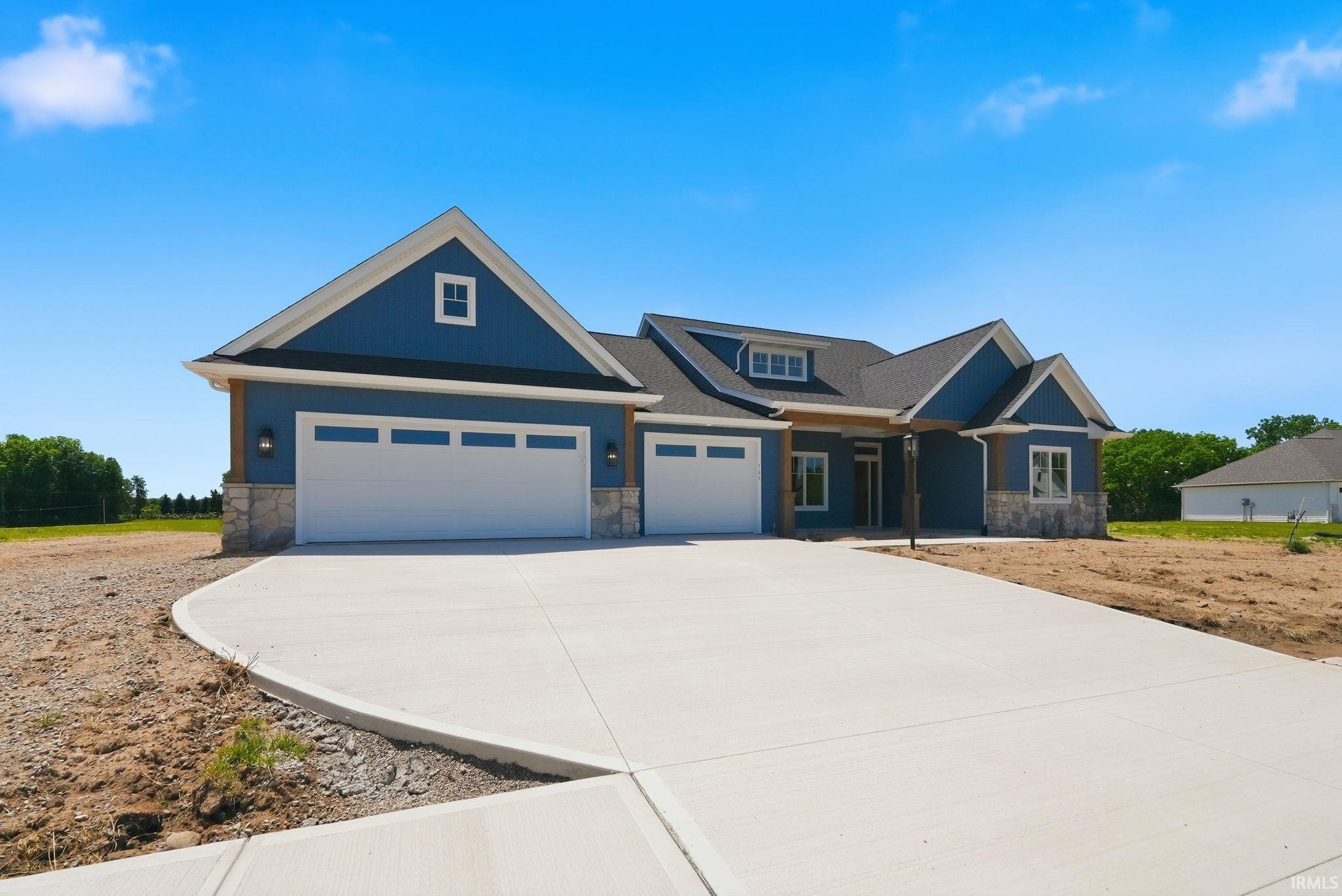 Blue exterior with stone accents and white trim