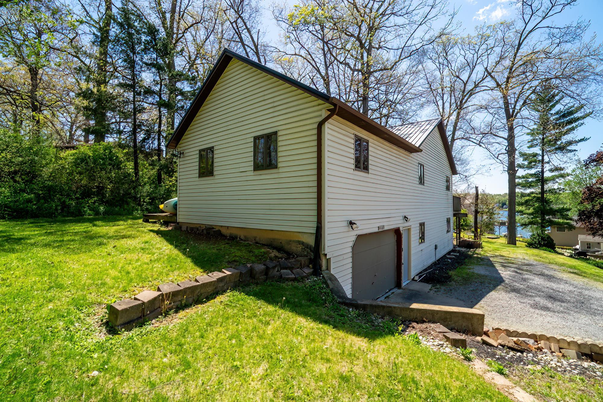 Two-story siding exterior with a metal roof