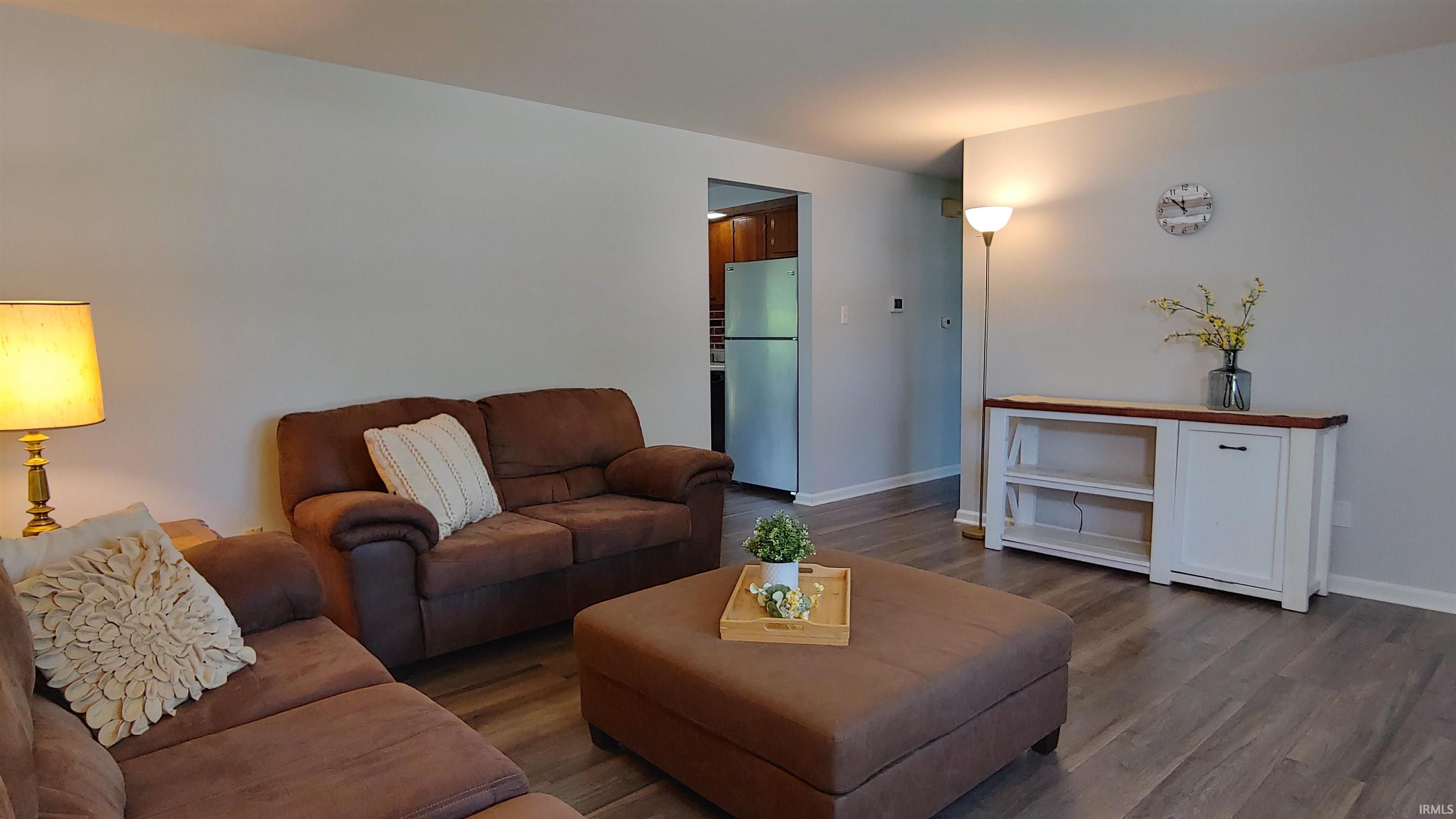 Living area has light gray wall paint.