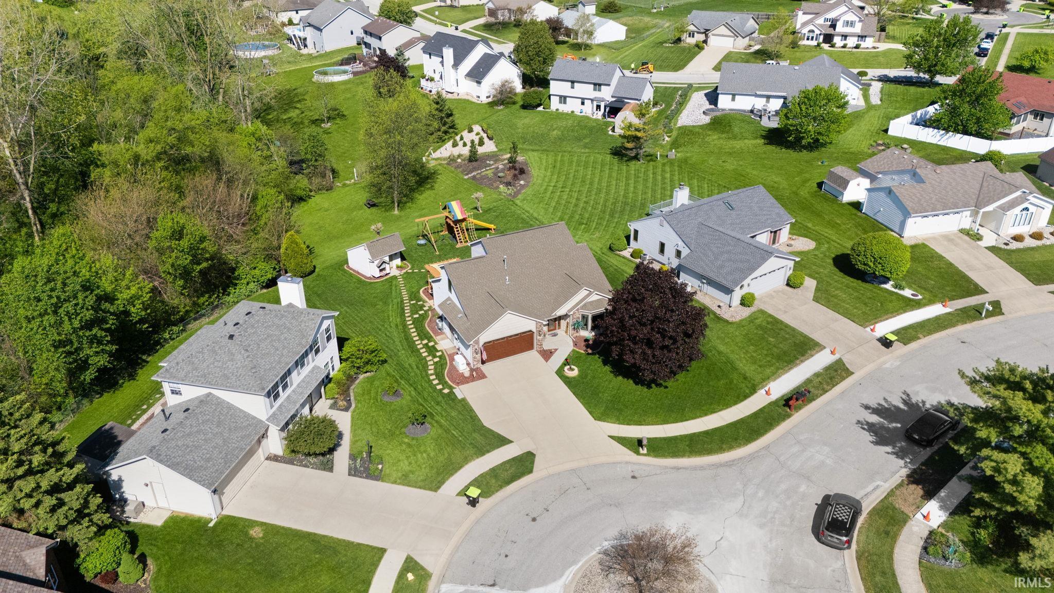 Aerial perspective showcasing a residential area with varied home styles