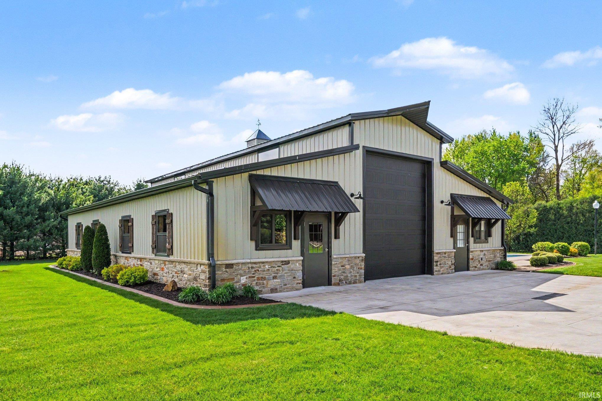 The insulated, heated shop area is 30x60 with additional space for pool mechanicals and the 960-sf guest house.  Floor drain, water, and natural gas all plumbed to shop with room for your toys and workshop area