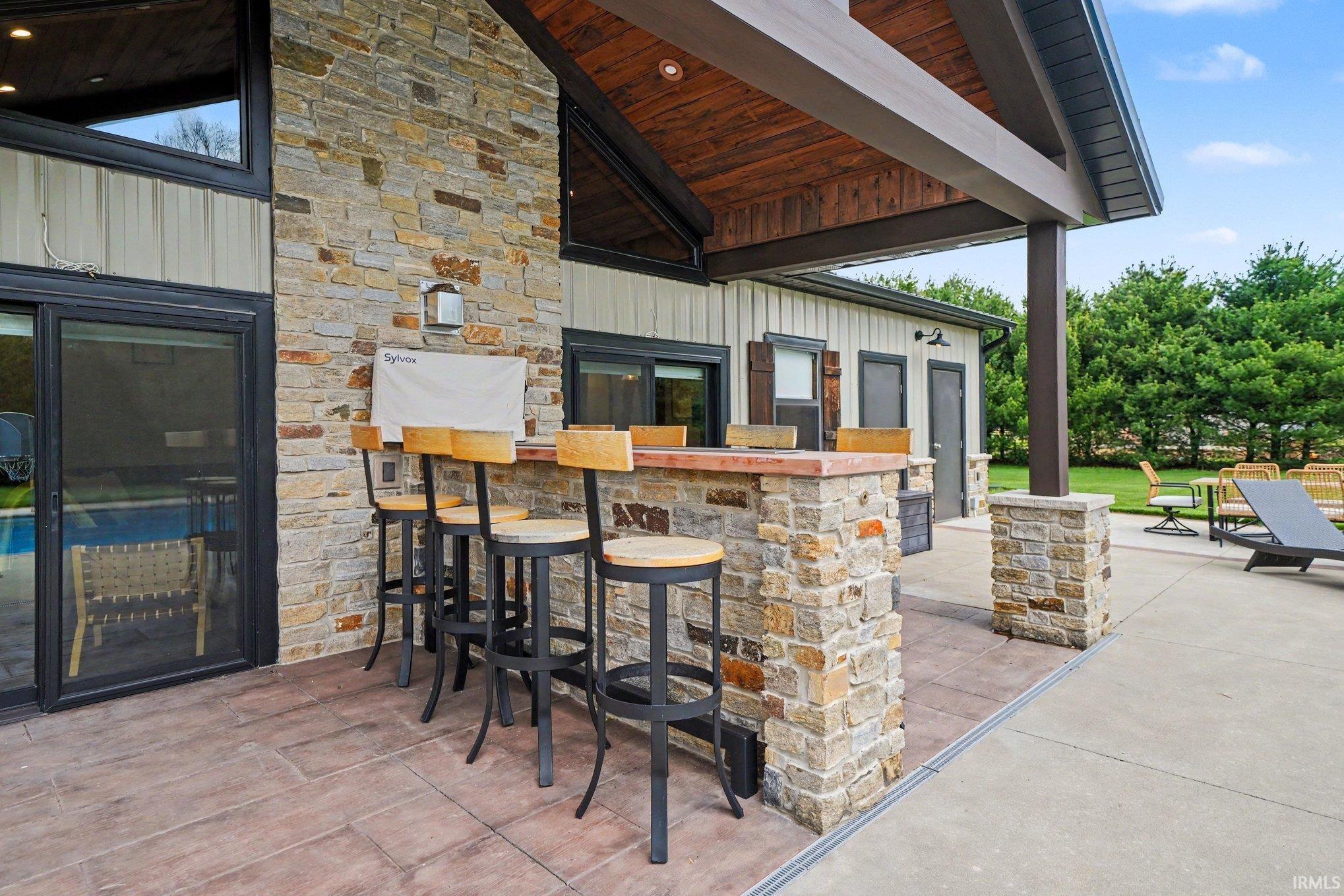 Entertain your guests around the natural gas fireplace late into the evenings while watching the game or enjoying the pool