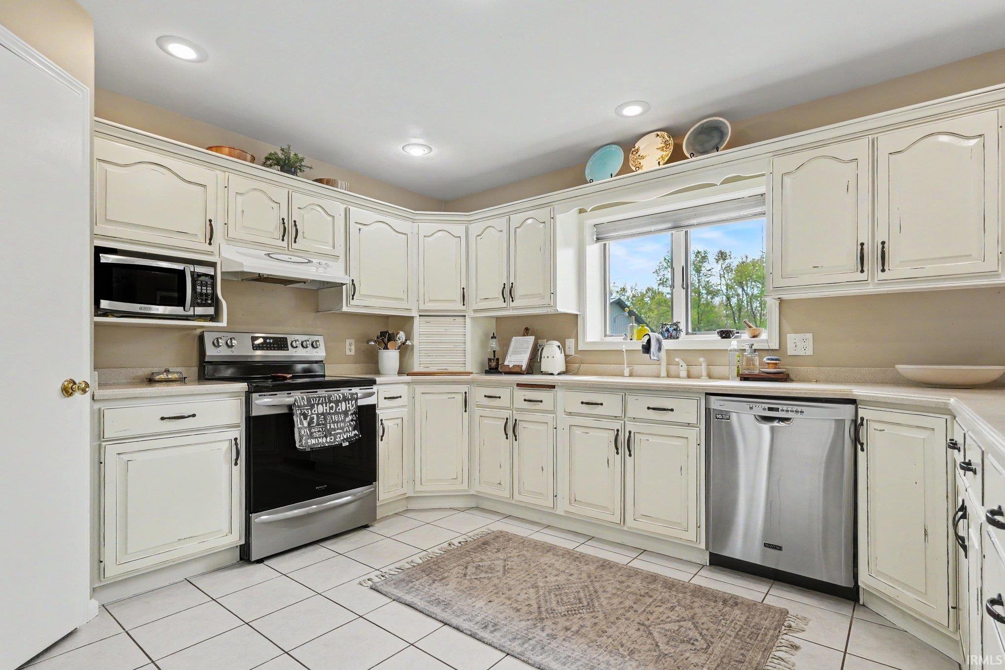 Kitchen includes updated appliances
