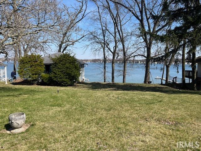 View of grassy yard featuring a water view