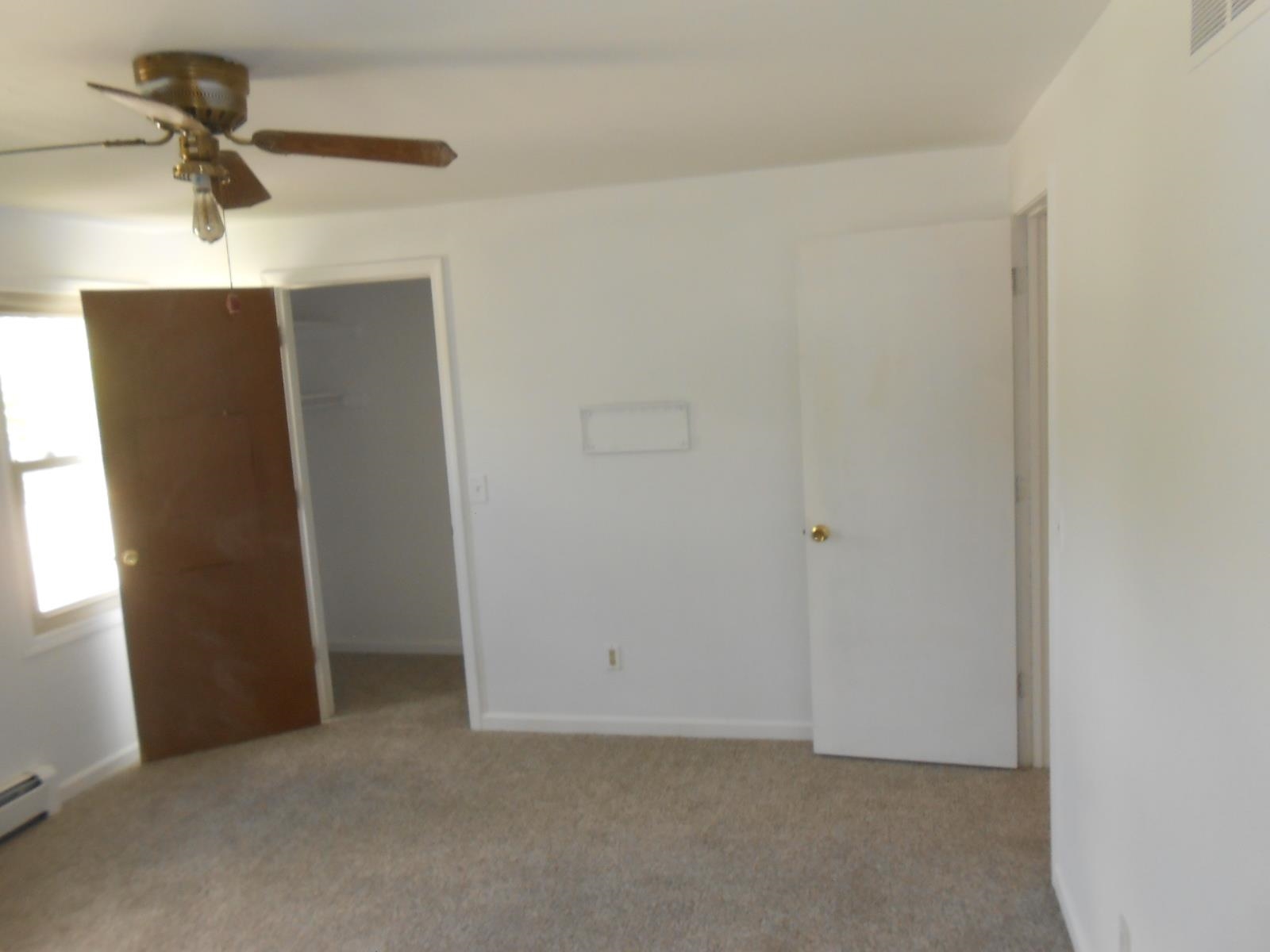 Neutral tone carpeting throughout